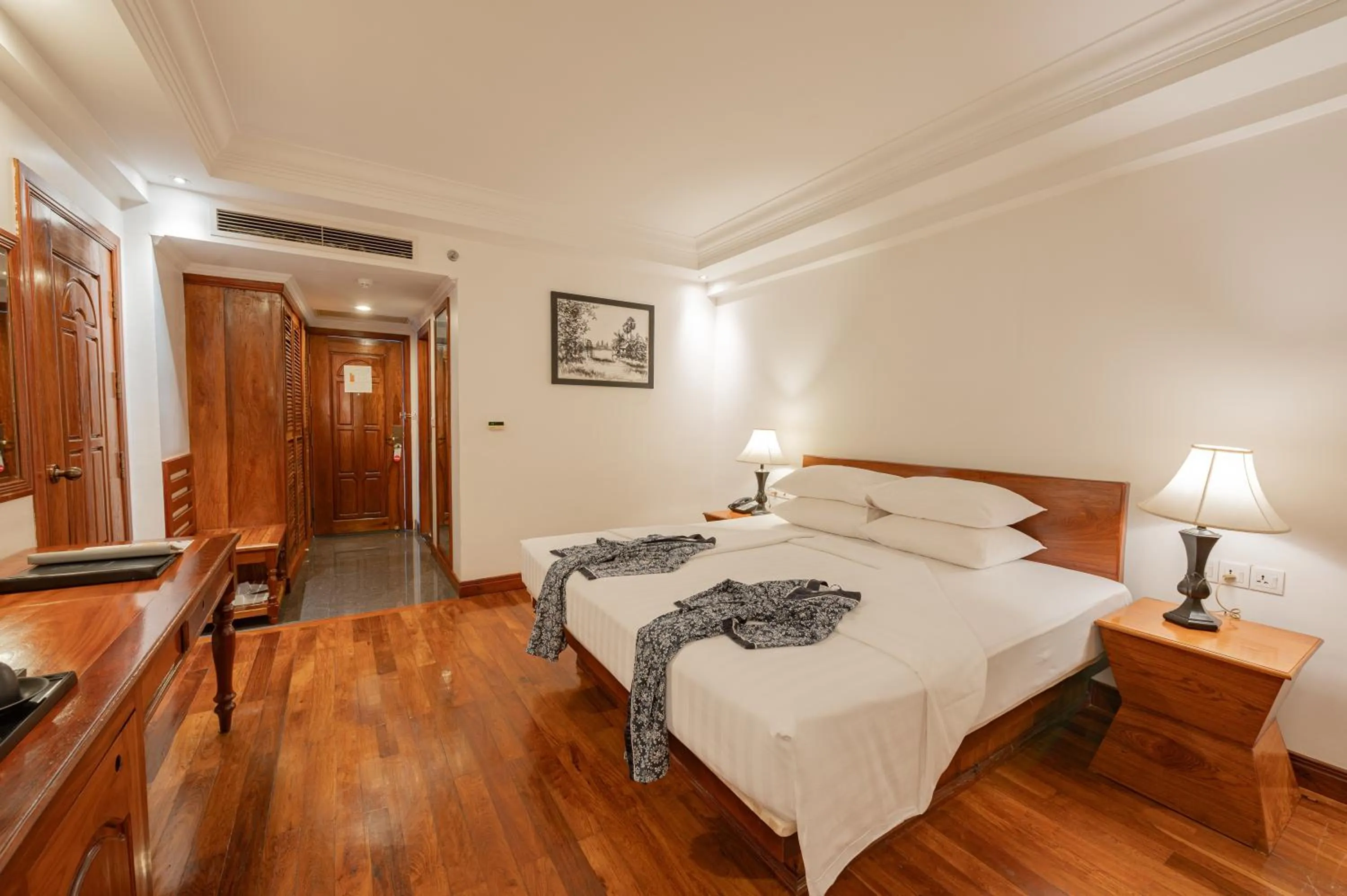 Photo of the whole room, Bed in Somadevi Angkor Premium