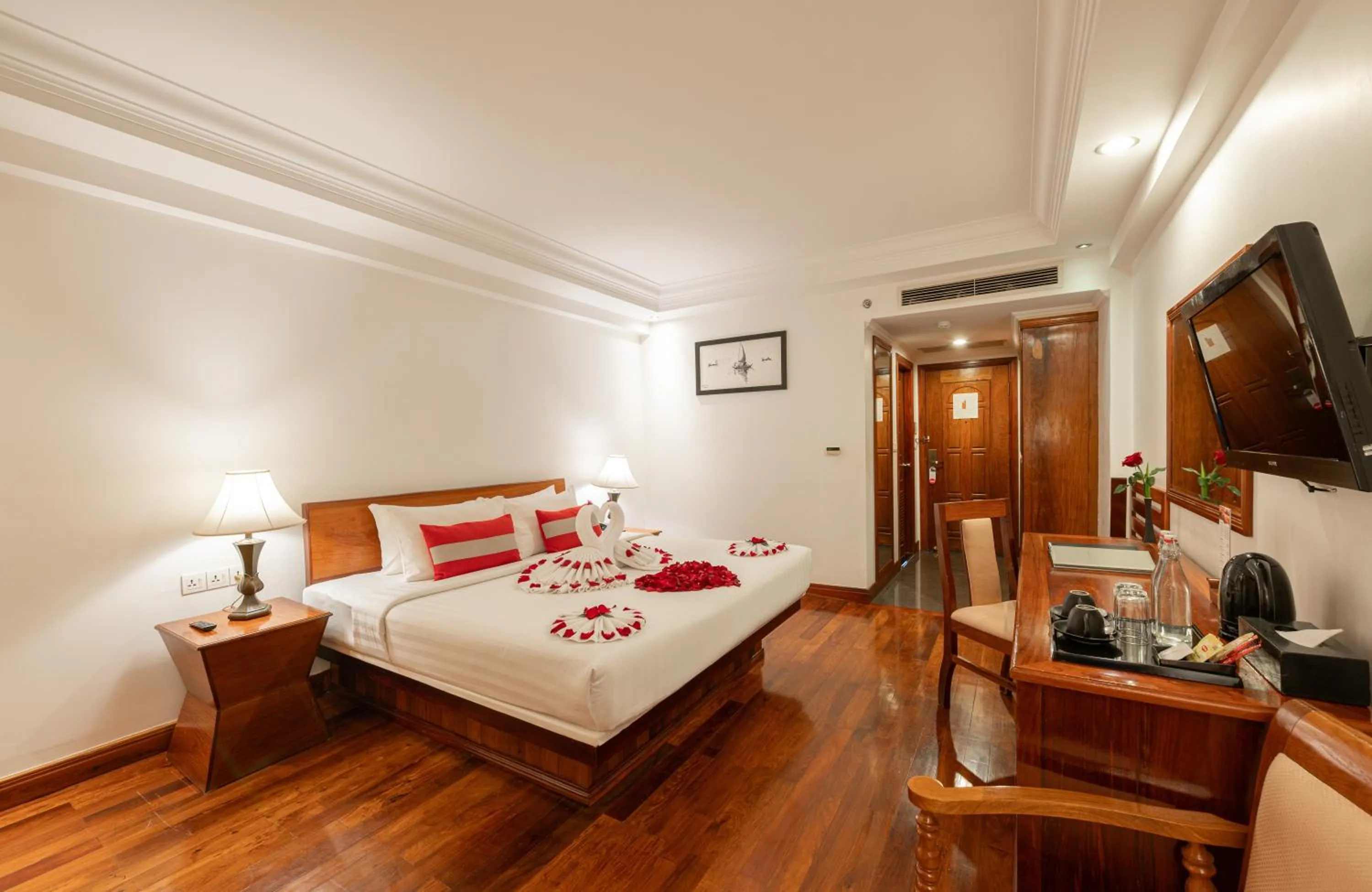 Photo of the whole room, Bed in Somadevi Angkor Premium