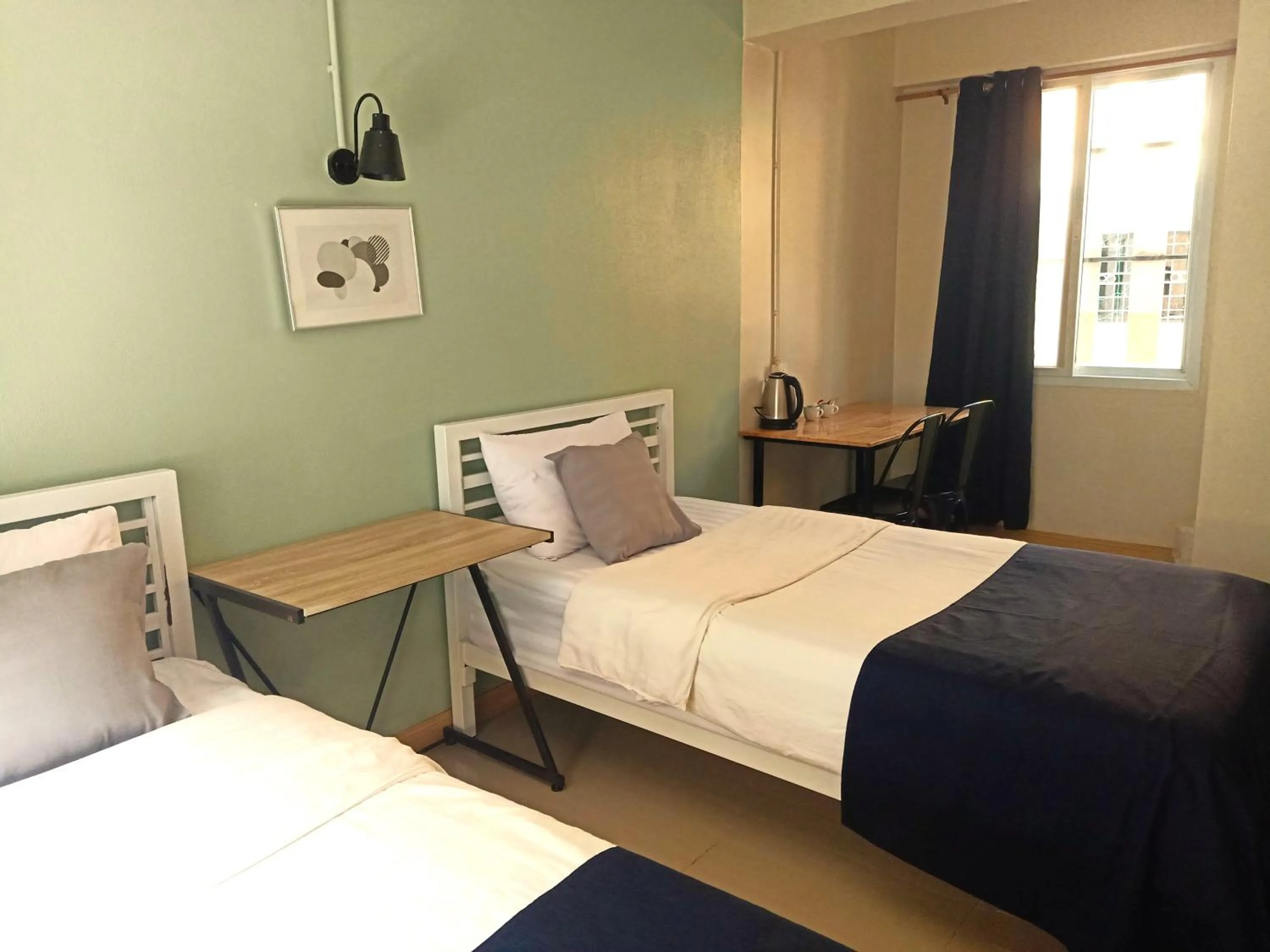 Photo of the whole room, Bed in Baan Nuk Anong