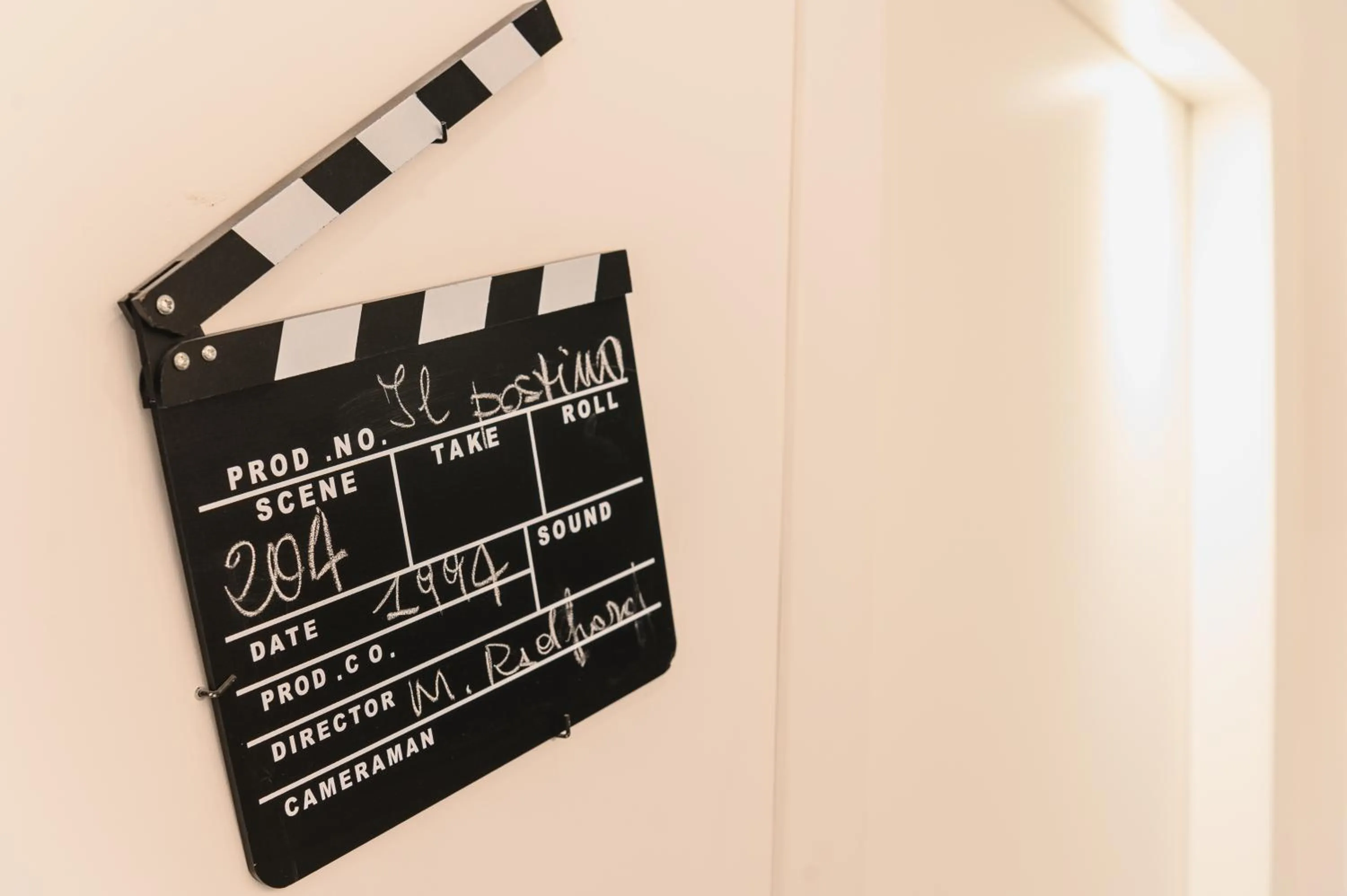 Property logo or sign in Hotel CineApollo - Ogni camera un film!