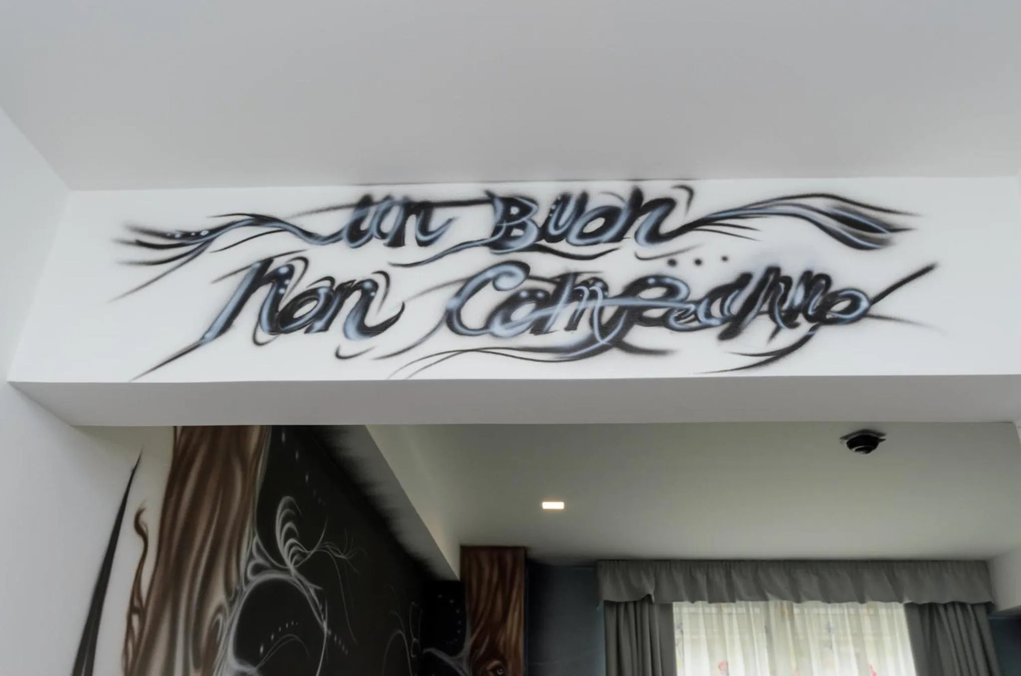 Property logo or sign in Hotel CineApollo - Ogni camera un film!