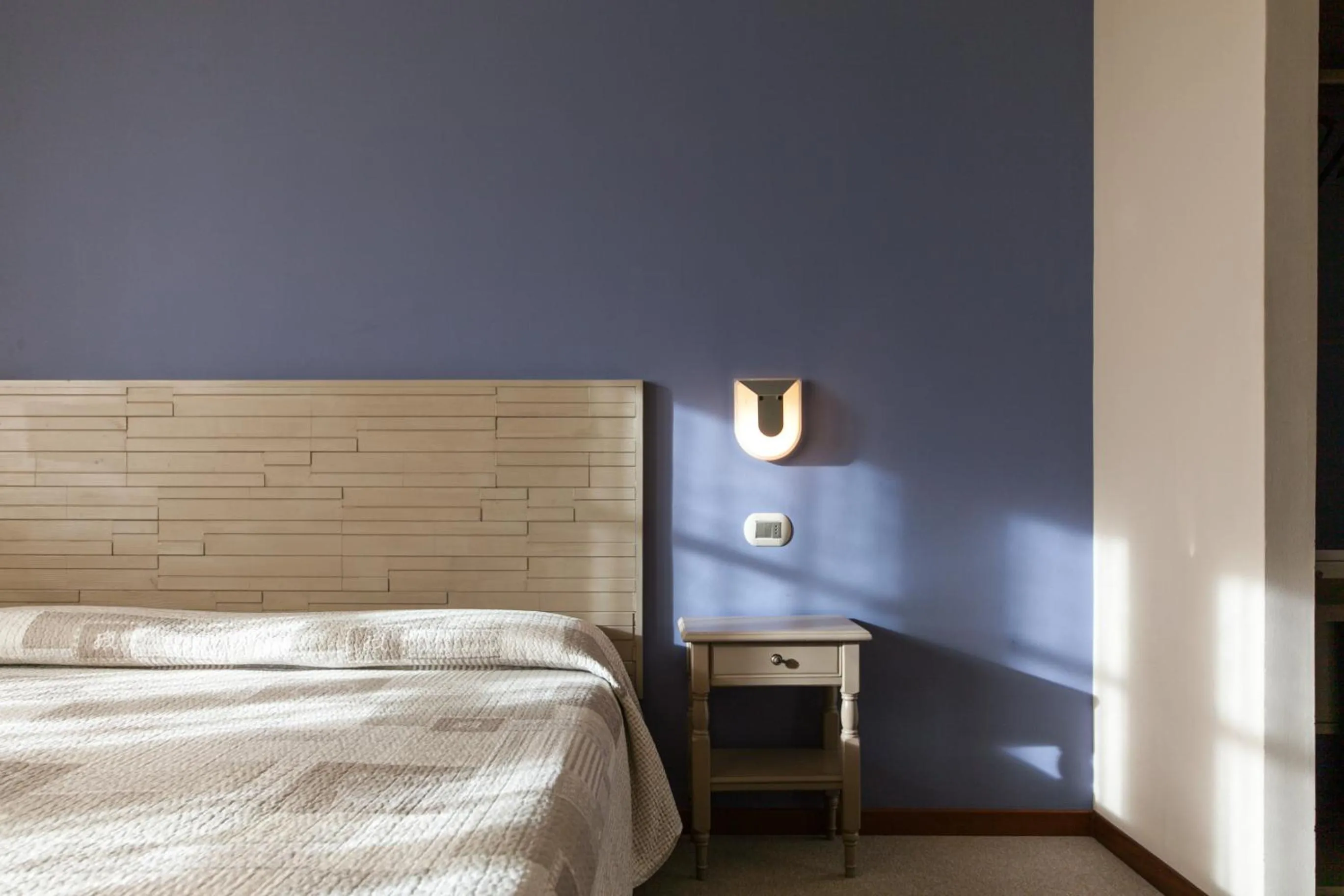 Bed in La Grotta Hotel