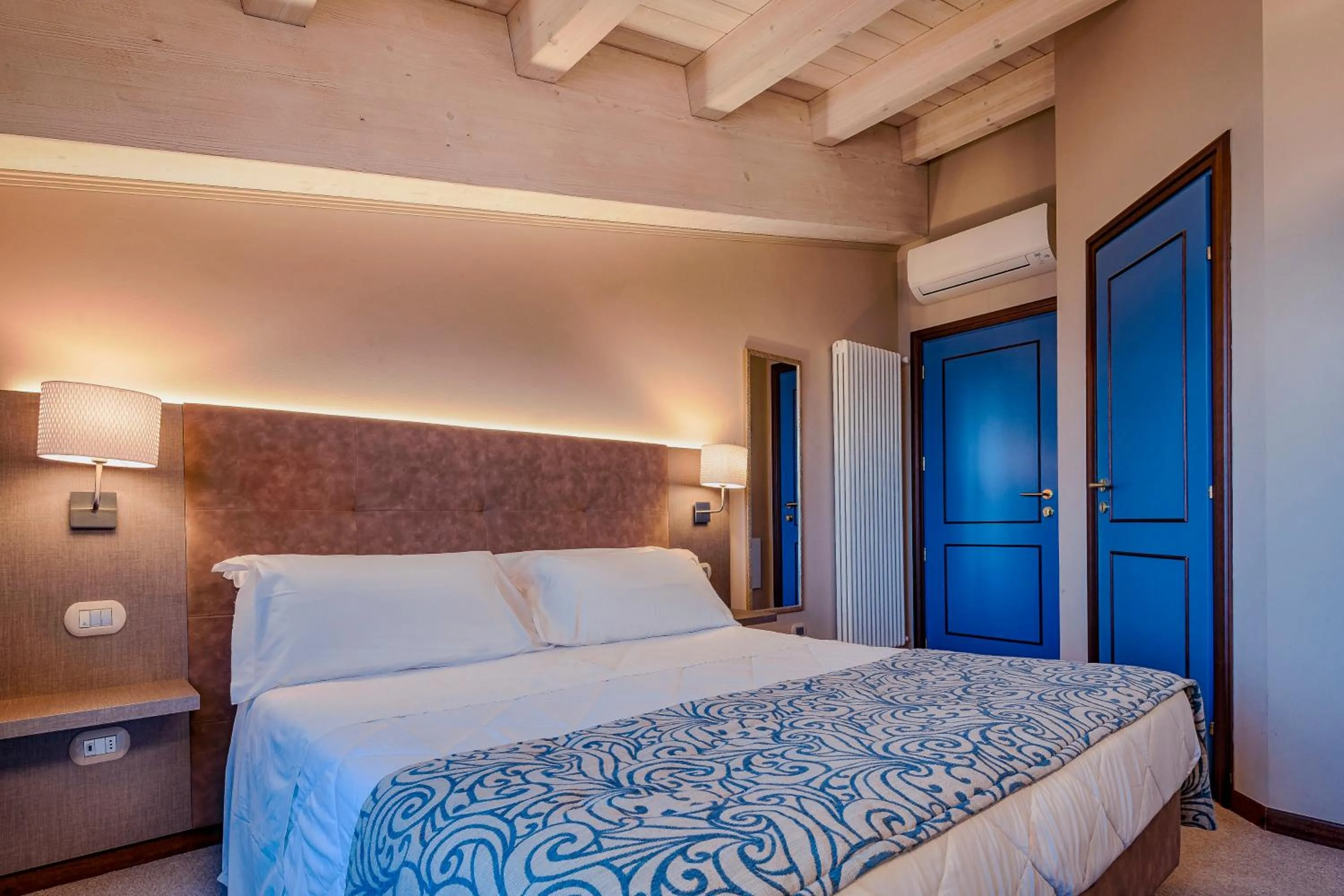 Bed in La Grotta Hotel