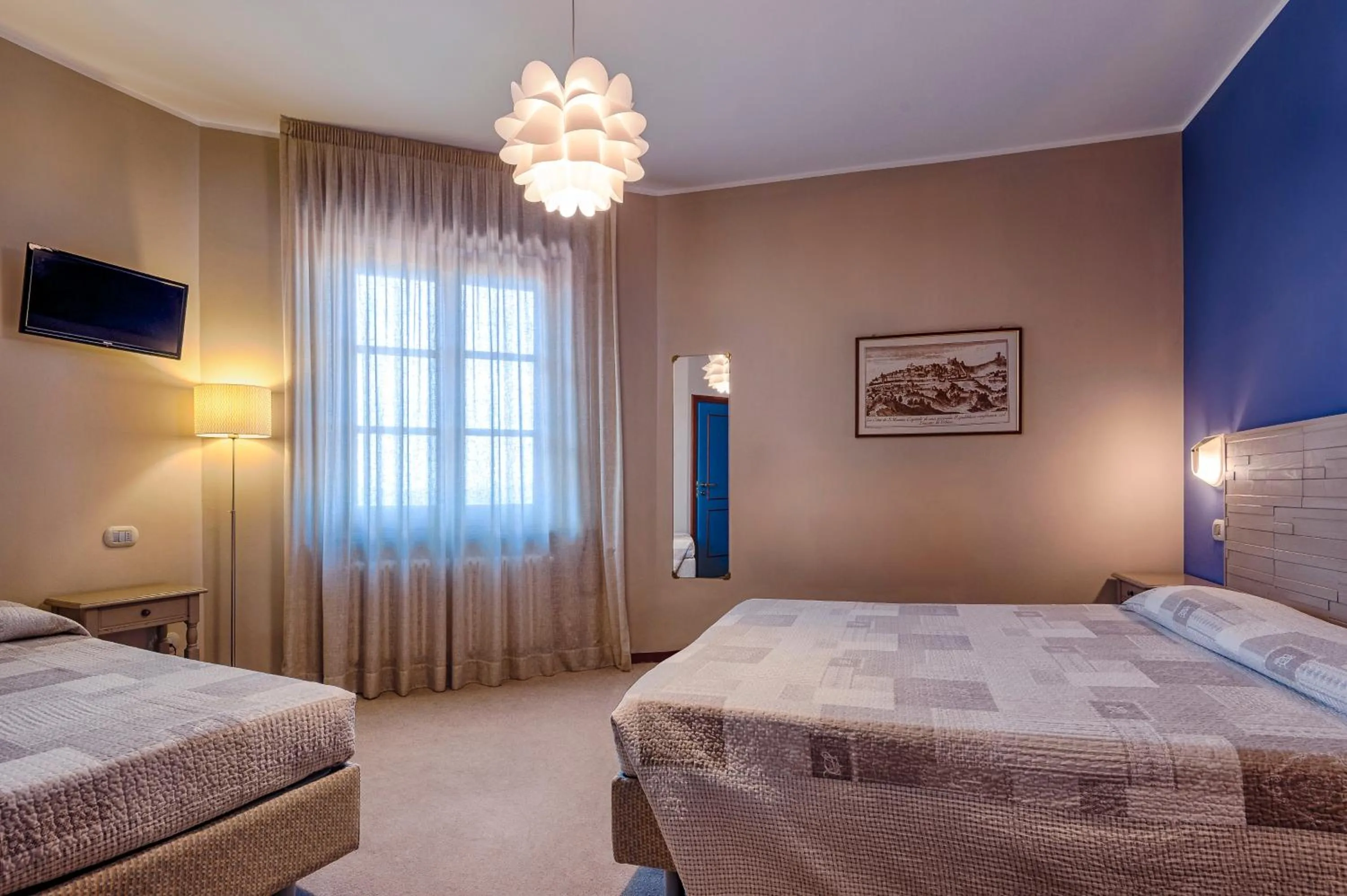 Bed in La Grotta Hotel