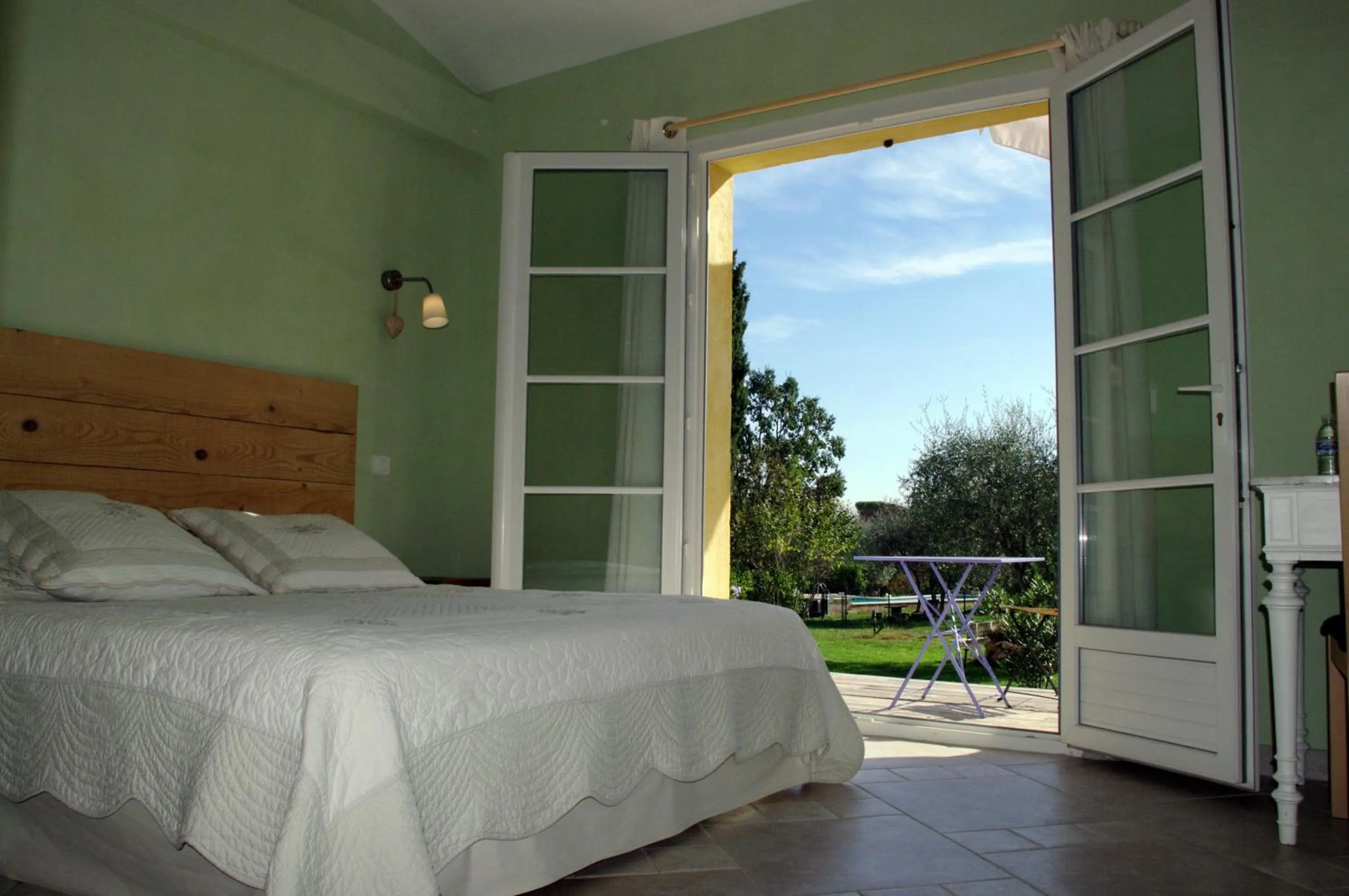 Bed in Chambres d'Hôtes Carpe Diem