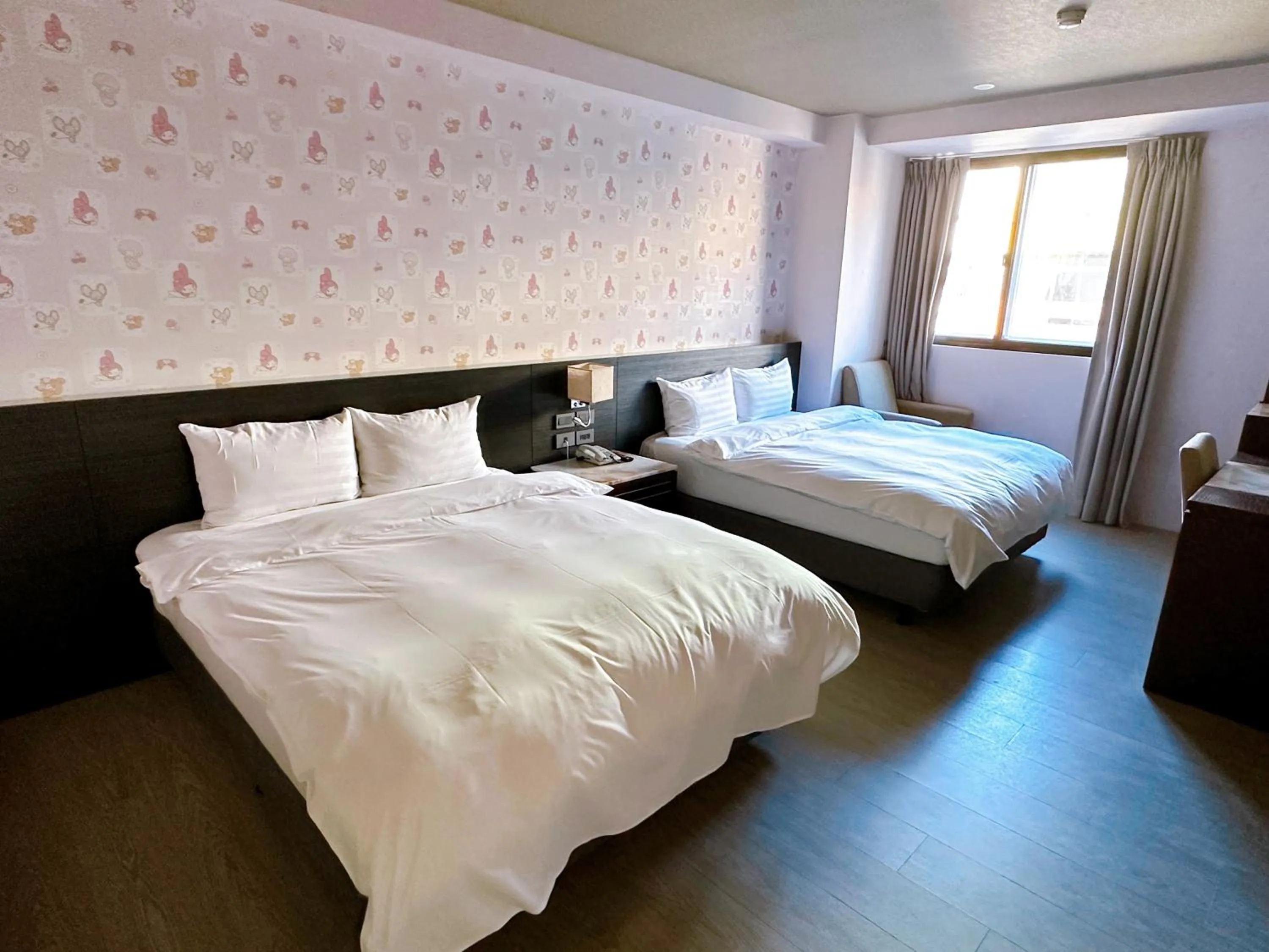 Bedroom in DLInn Hotel