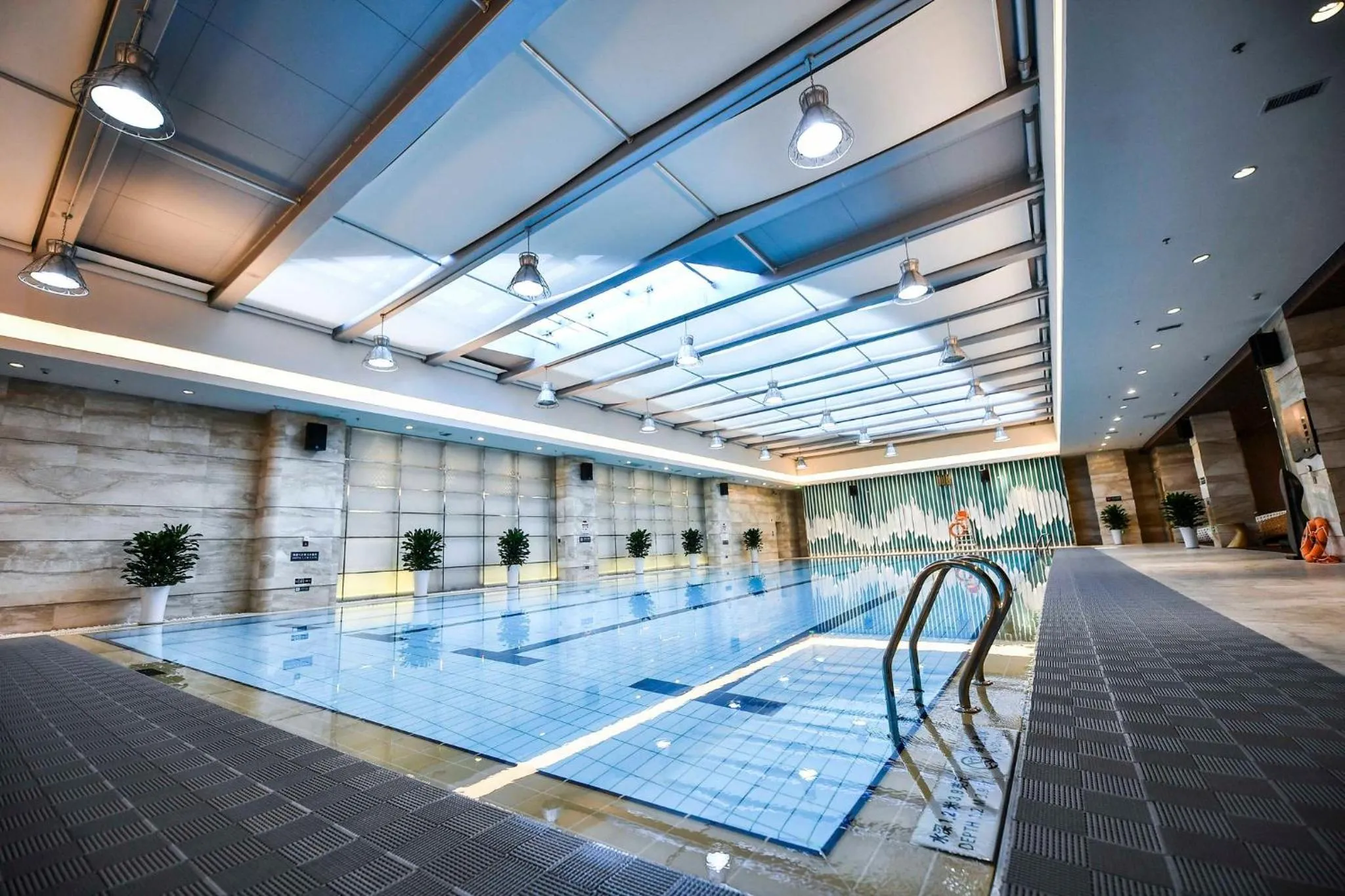 Swimming pool in Crowne Plaza Dalian Sports Center by IHG