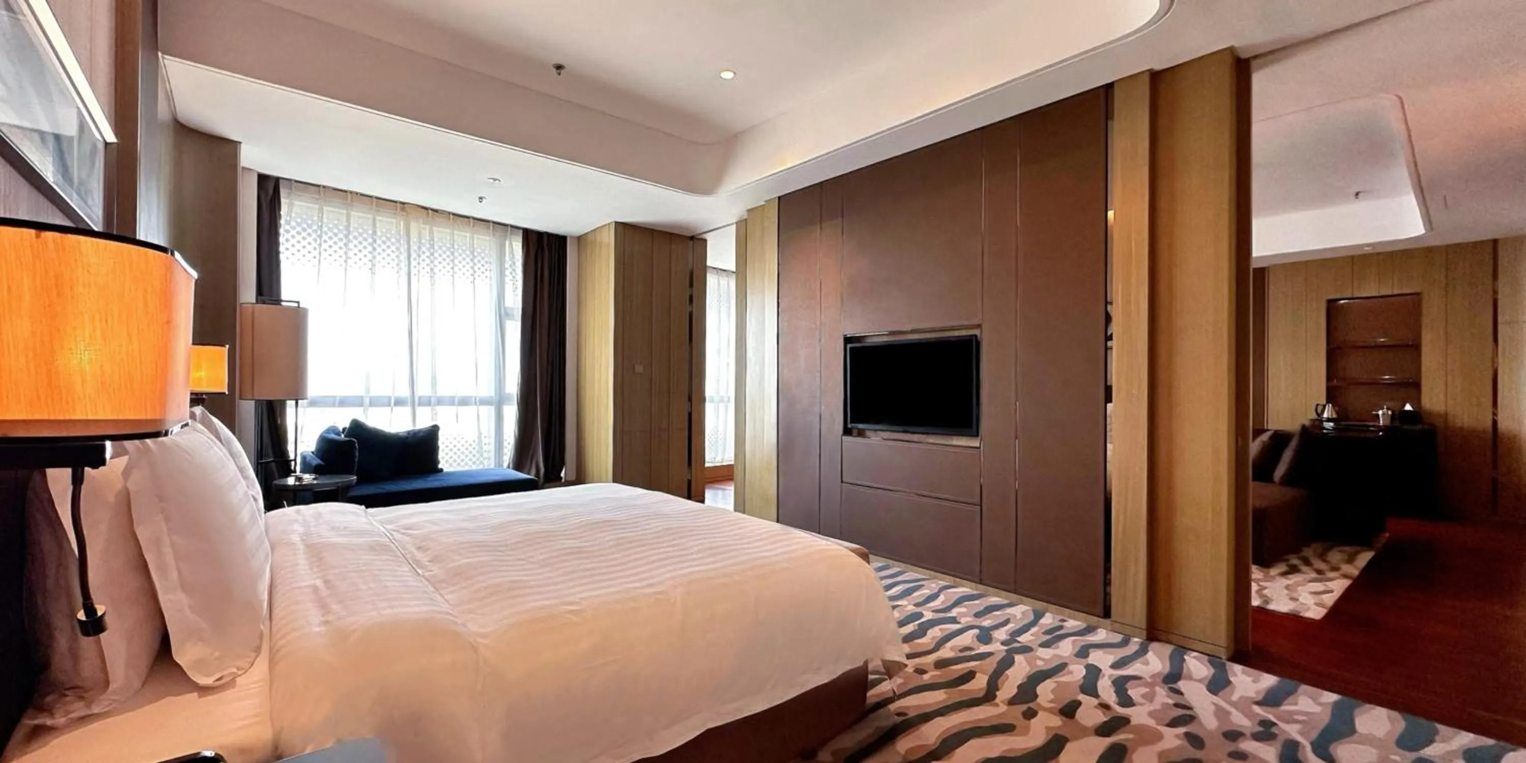 Photo of the whole room, Bed in Crowne Plaza Dalian Sports Center by IHG