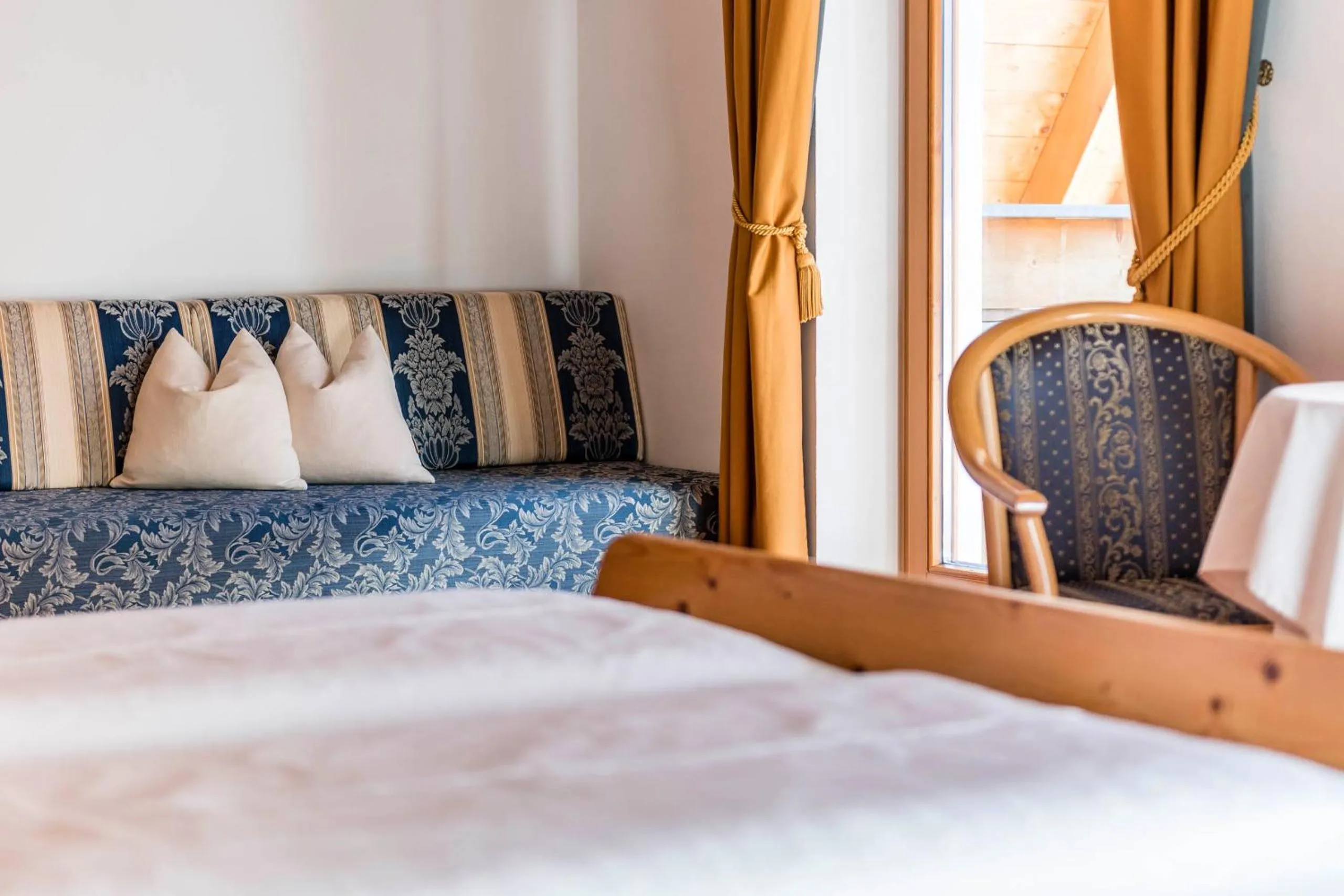 Bed in B&B Hotel Alpenrose Rooms & Apartments