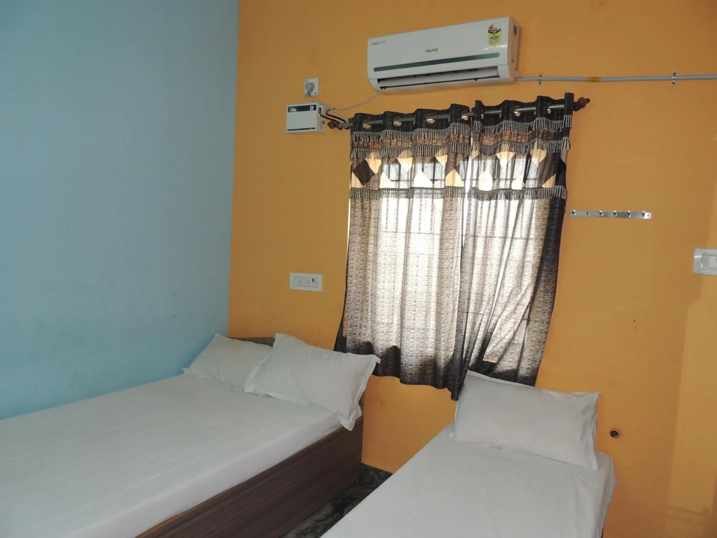 Deluxe Triple Room - single occupancy in Radha Party Hall Deluxe Triple Room - single occupancy in Radha Party Hall
