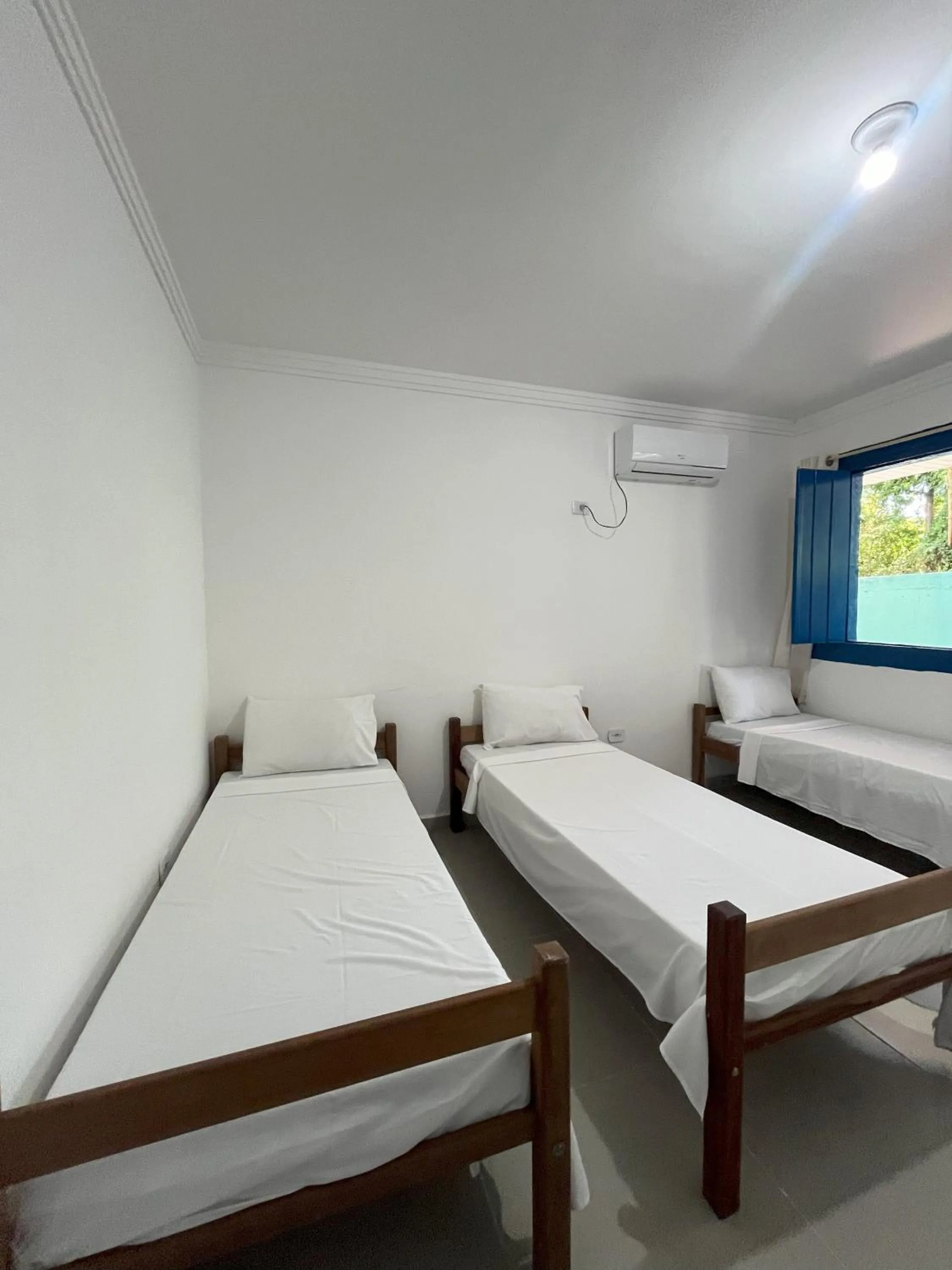 Bedroom in Morada dos Coqueiros Praia Hotel