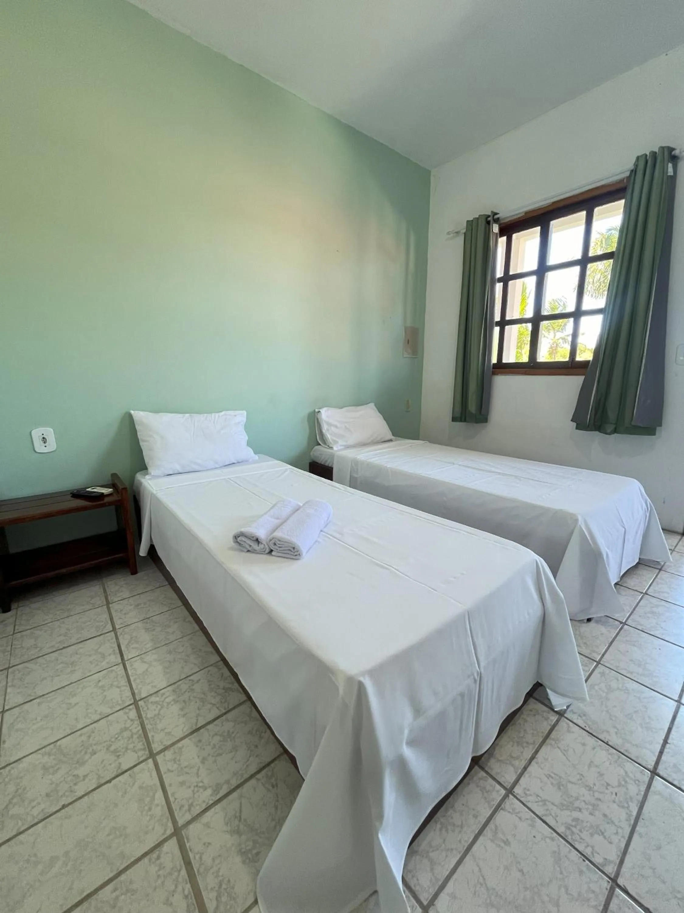 Bedroom in Morada dos Coqueiros Praia Hotel