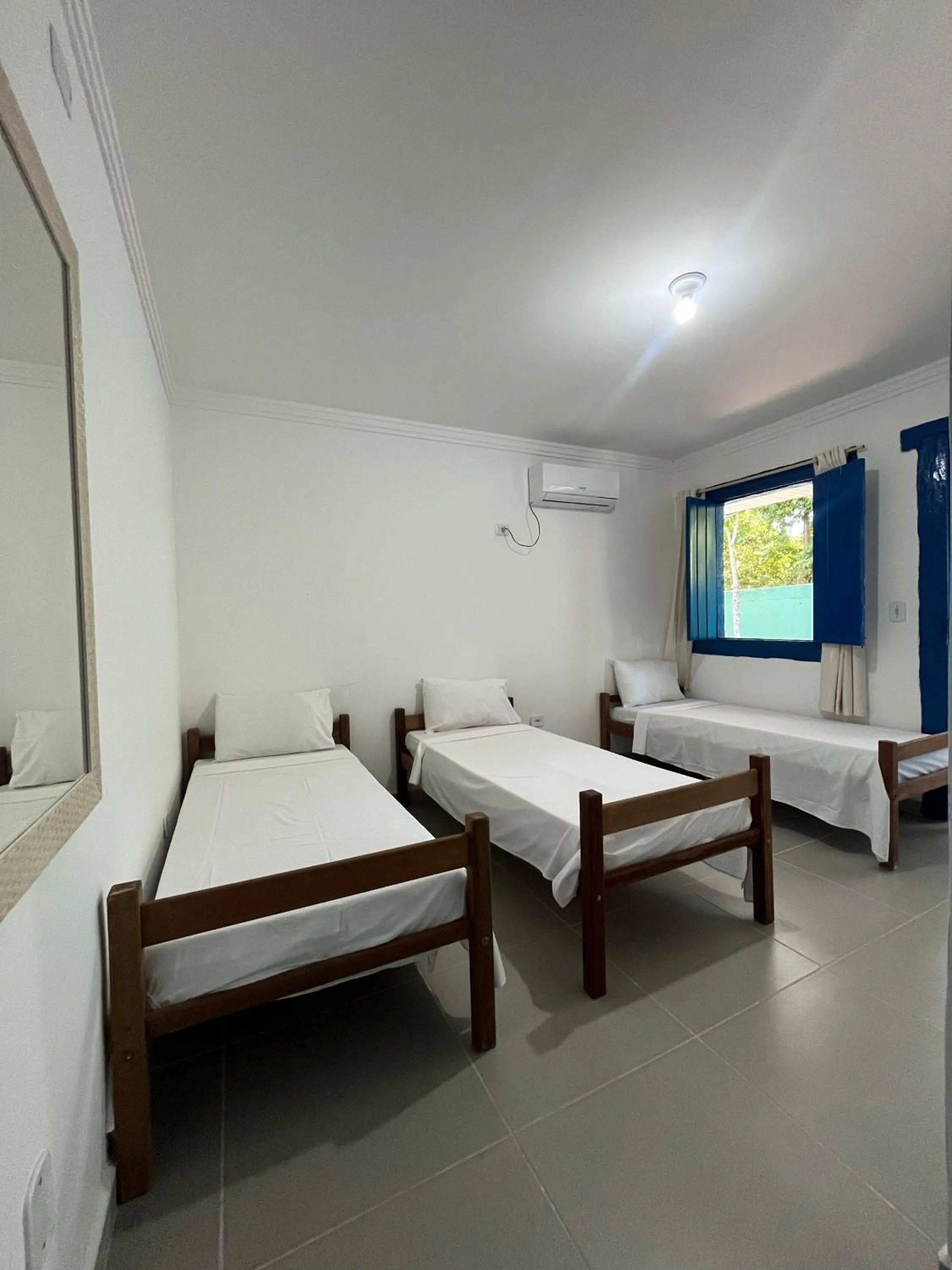 Bedroom in Morada dos Coqueiros Praia Hotel