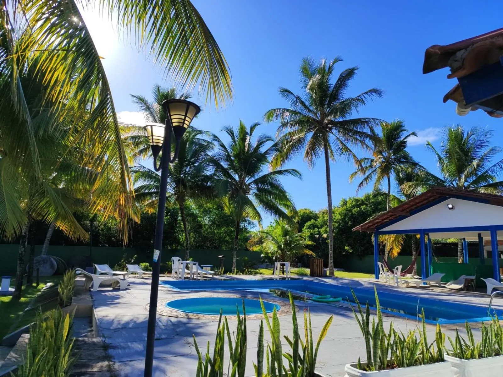 Swimming pool in Morada dos Coqueiros Praia Hotel