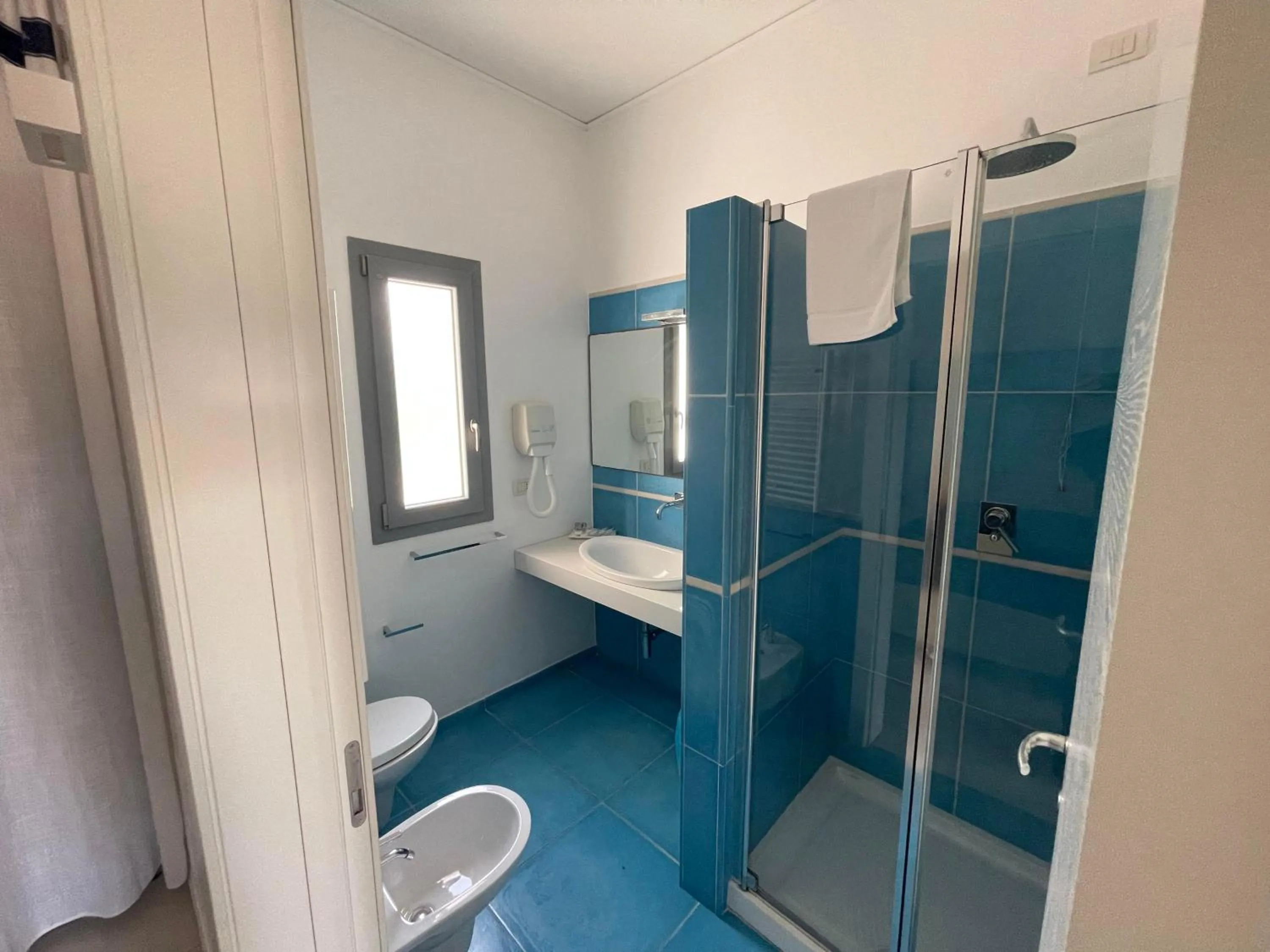 Bathroom in Baia Sangiorgio Hotel & Beach Club