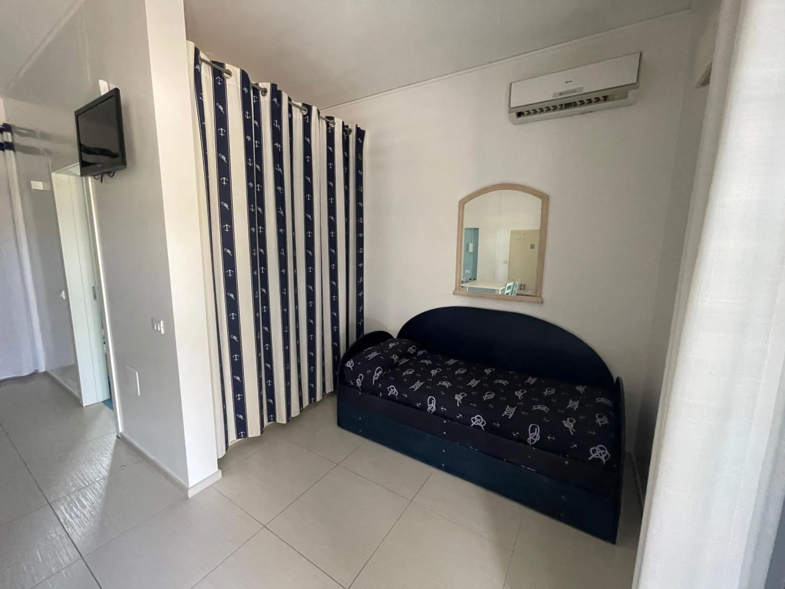 bunk bed, Bed in Baia Sangiorgio Hotel & Beach Club