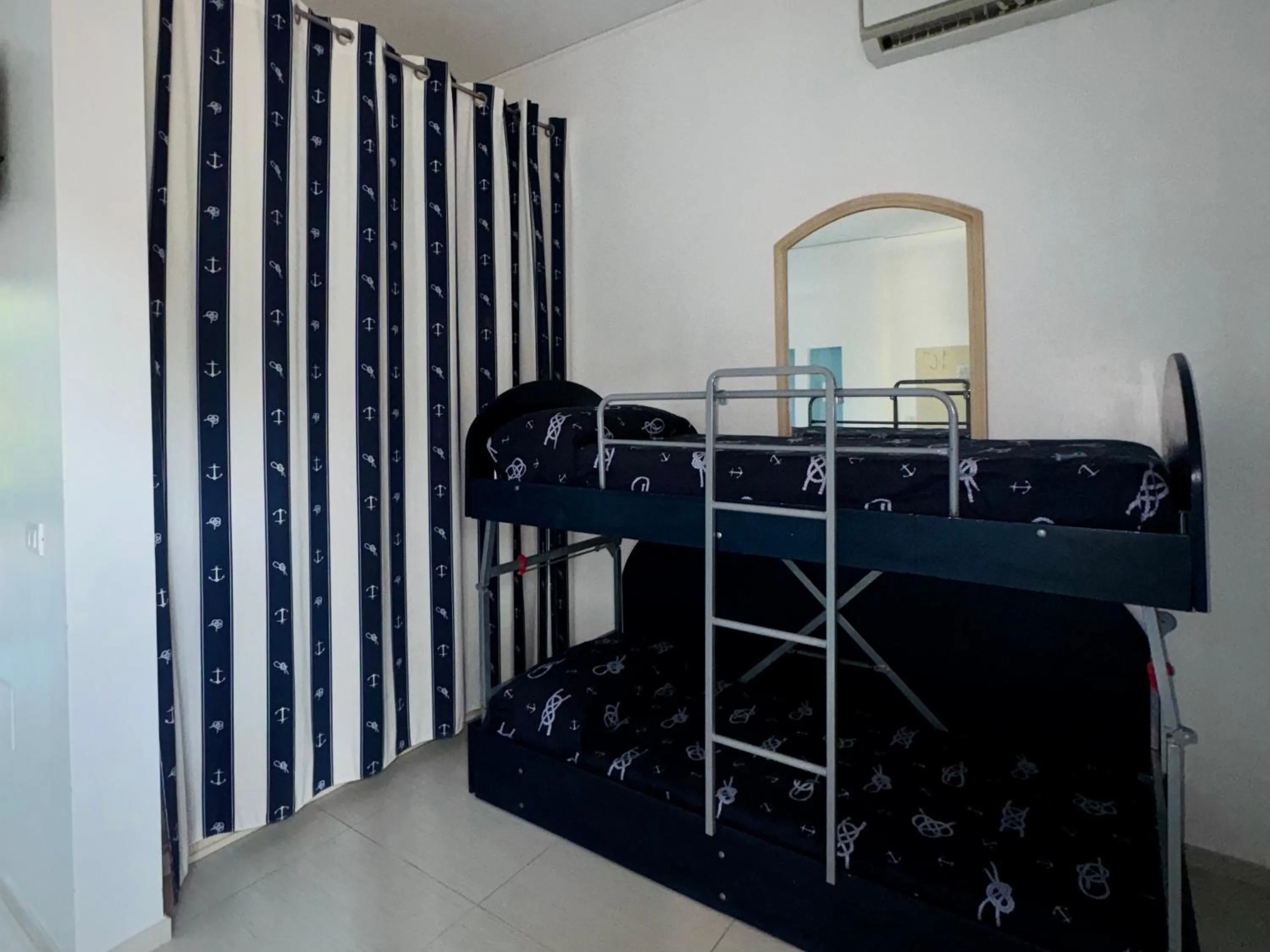 bunk bed, Bed in Baia Sangiorgio Hotel & Beach Club