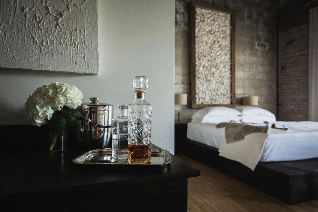 Bed in GunRunner Boutique Hotel