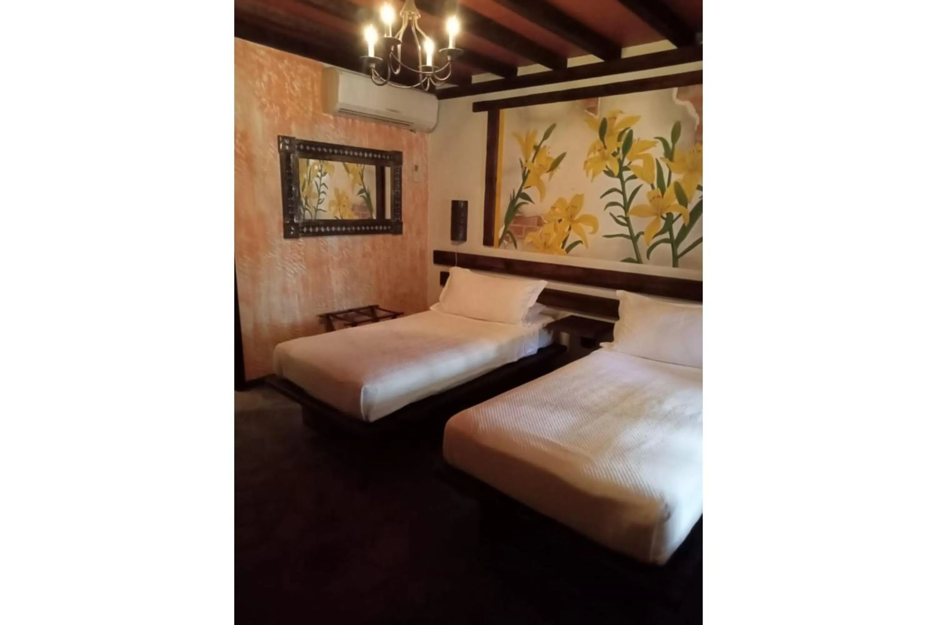 Bedroom in Hotel Boutique Posada De Las Flores Loreto