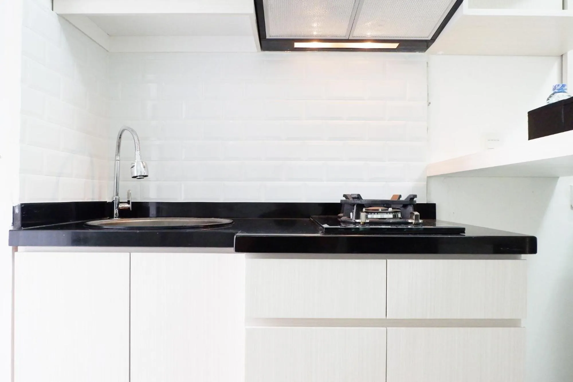 Kitchen or kitchenette in Exquisite 2BR Bassura City Apartment near Shopping Mall By Travelio