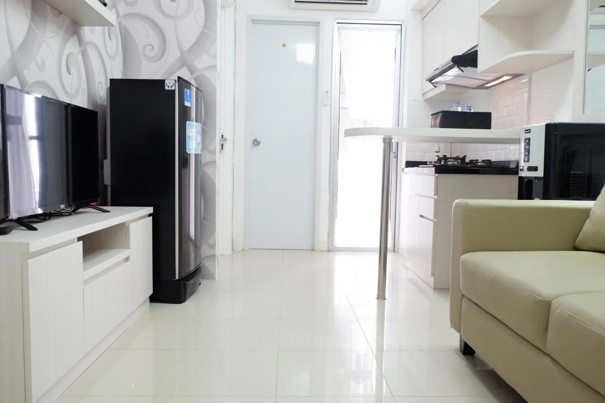 Photo of the whole room in Exquisite 2BR Bassura City Apartment near Shopping Mall By Travelio