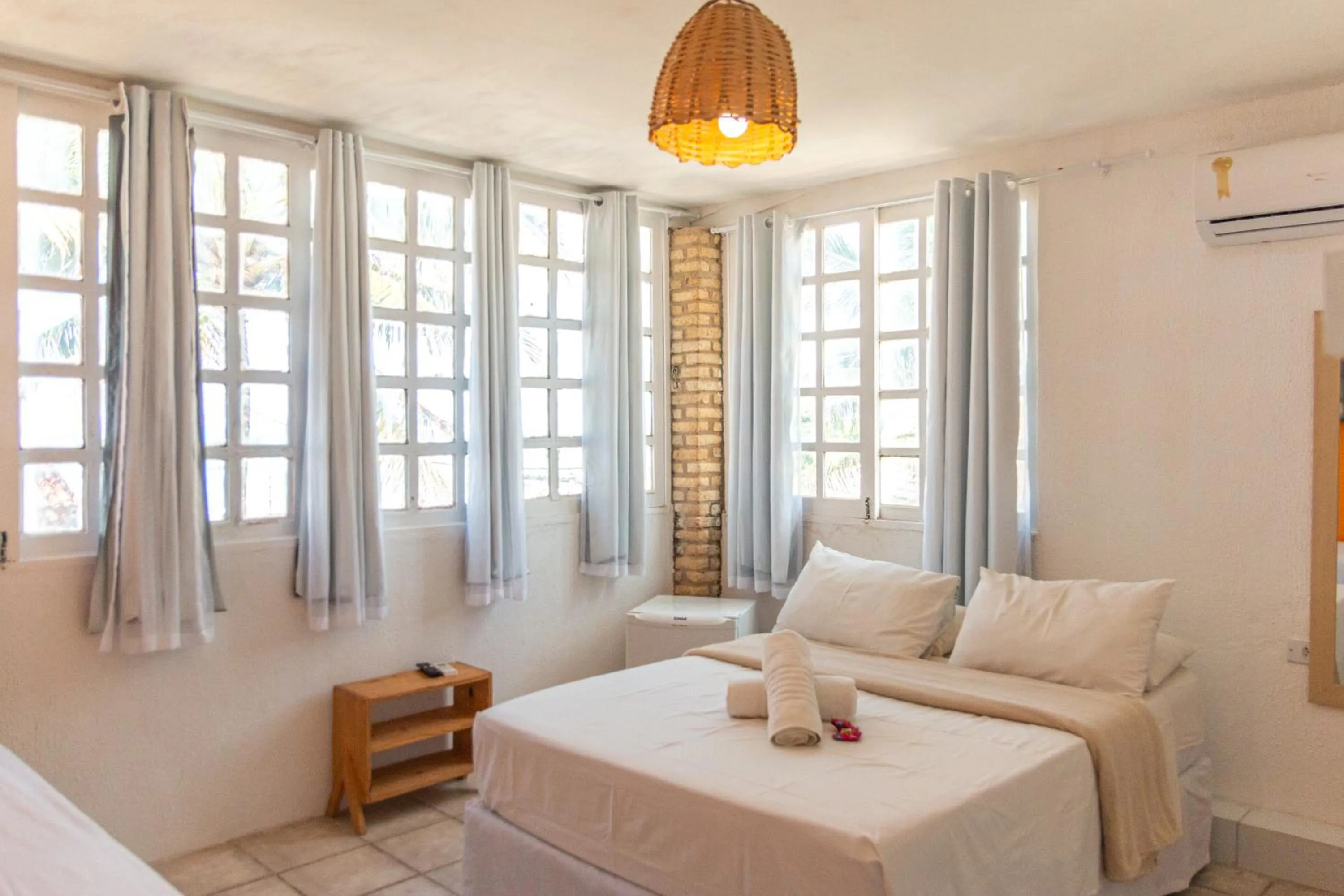 Triple Room with Sea View in Pousada La Bella Luna