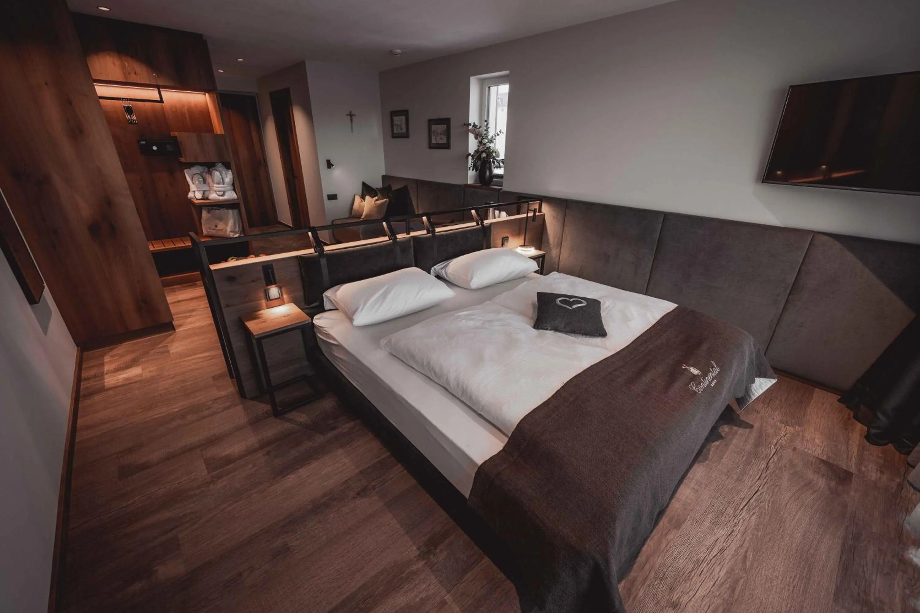 Bed in Hotel Continental Dolomites