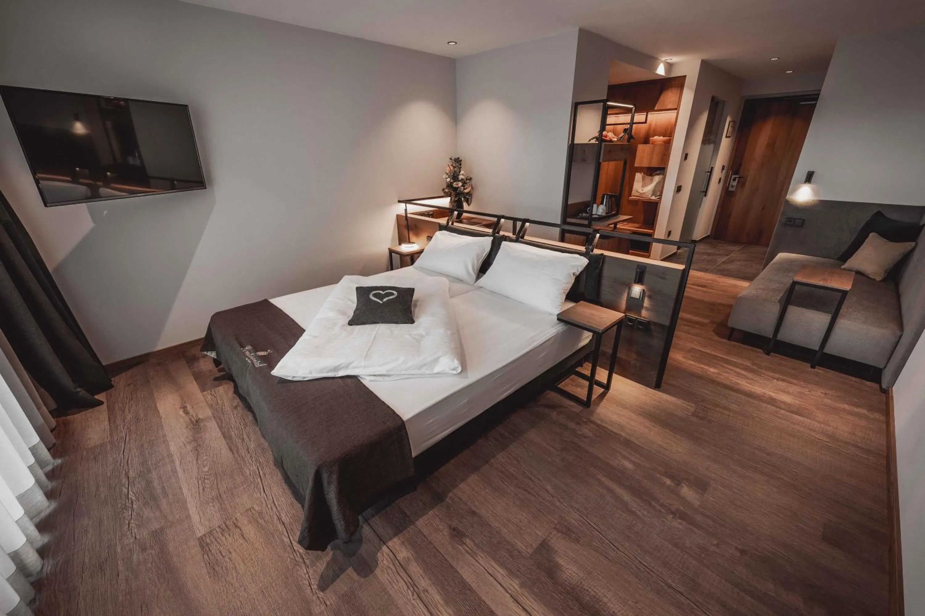 Bed in Hotel Continental Dolomites