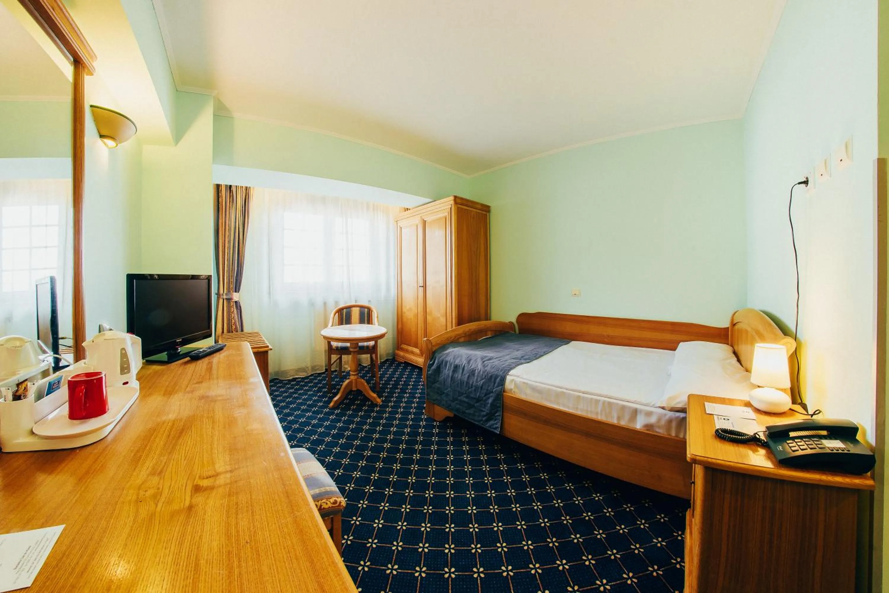 TV and multimedia, Bed in Hotel Best Western Bucovina