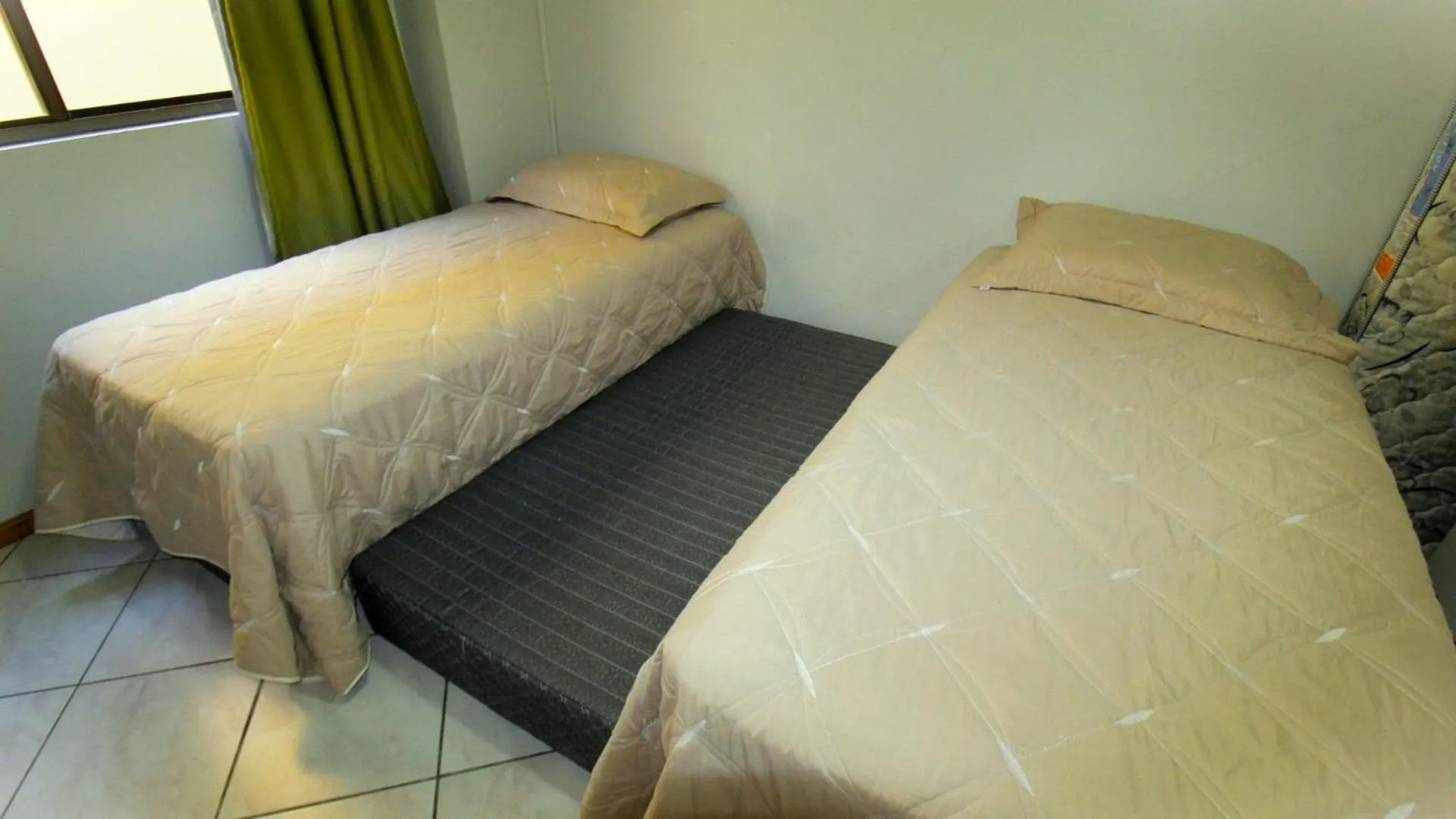 Bed in 1029 - Apartamento no centro de Bombinhas - Residencial estrela do mar 2 104 A