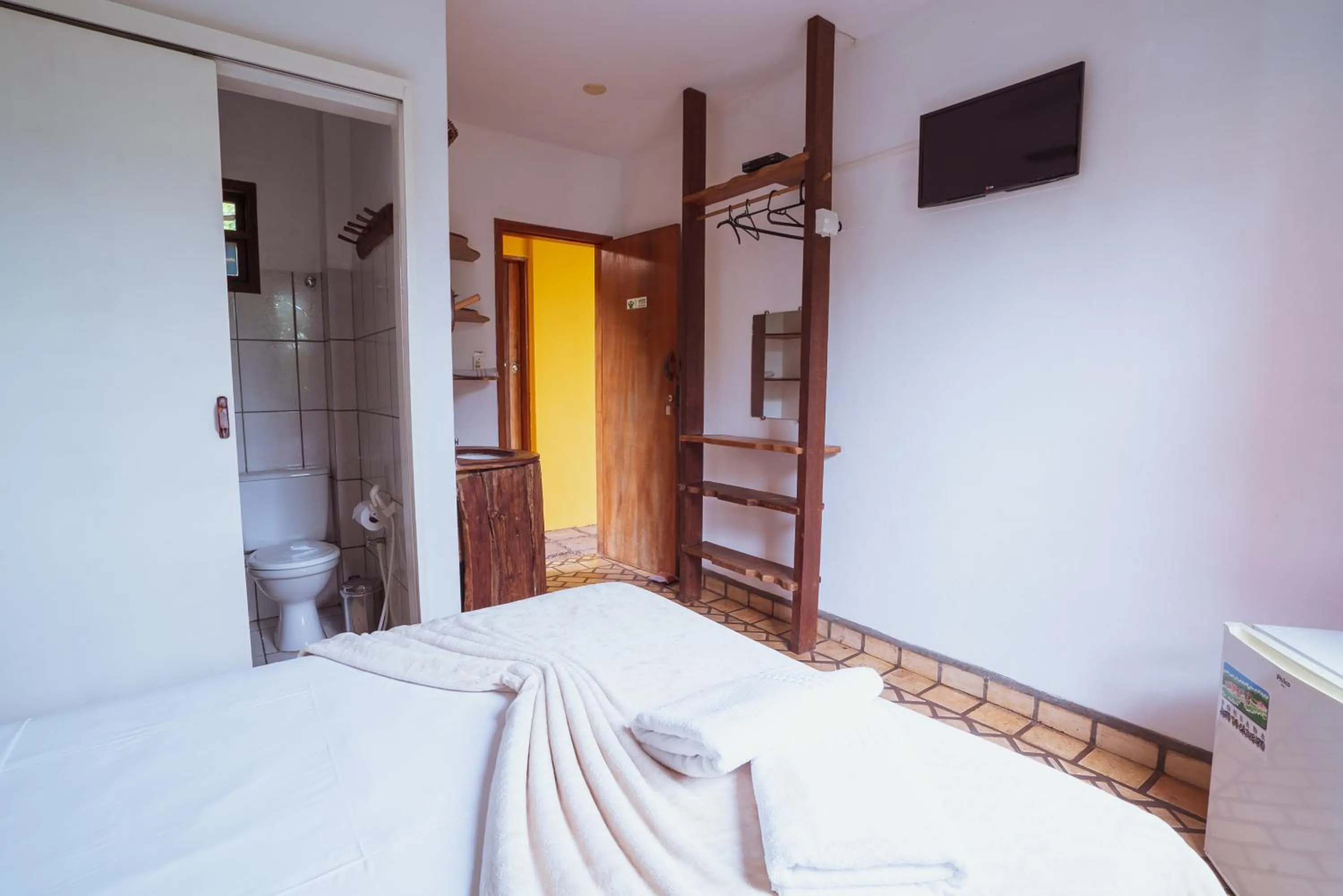 Bed in Pousada Alto do Cajueiro