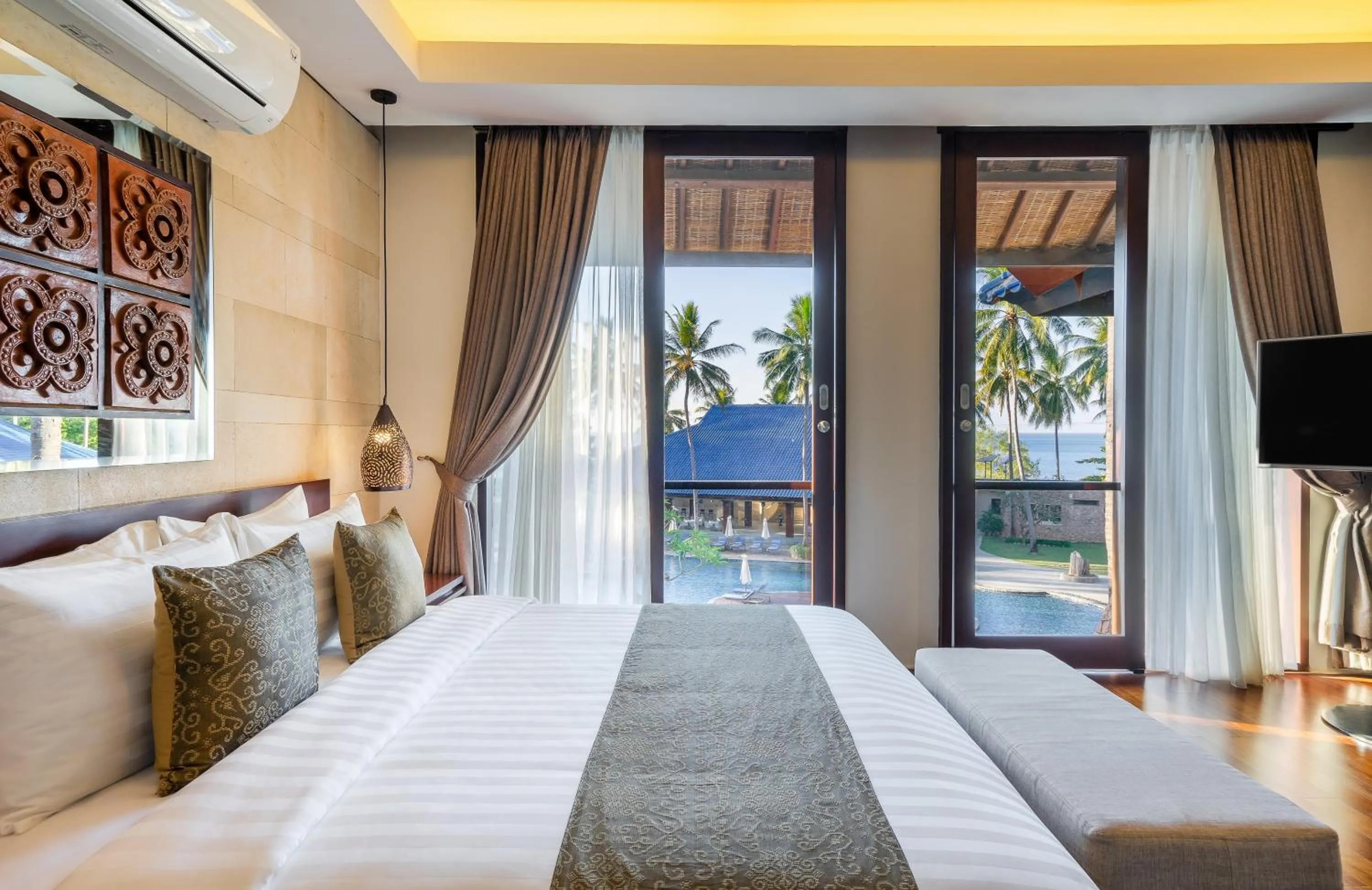 Bed in Sundancer Residences and Villas Lombok