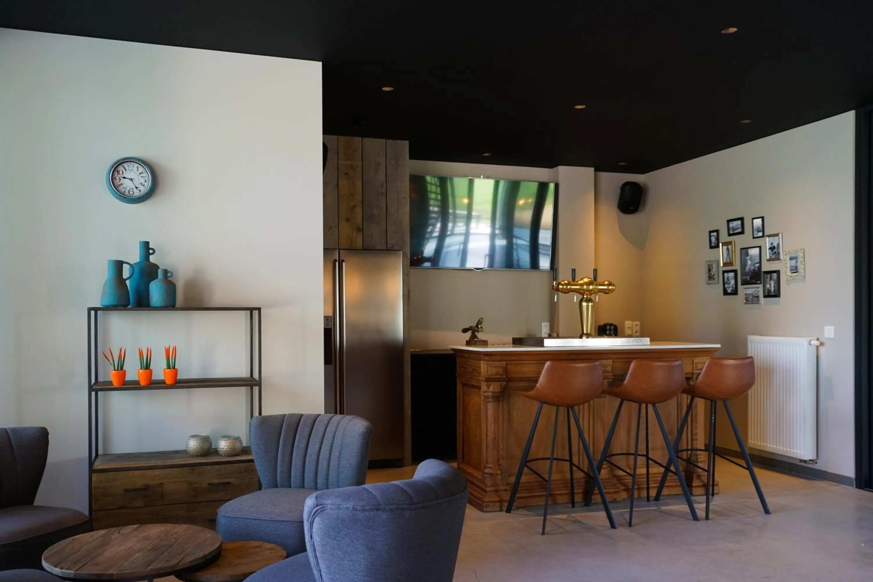 Communal lounge/ TV room in B&B Ten Doele