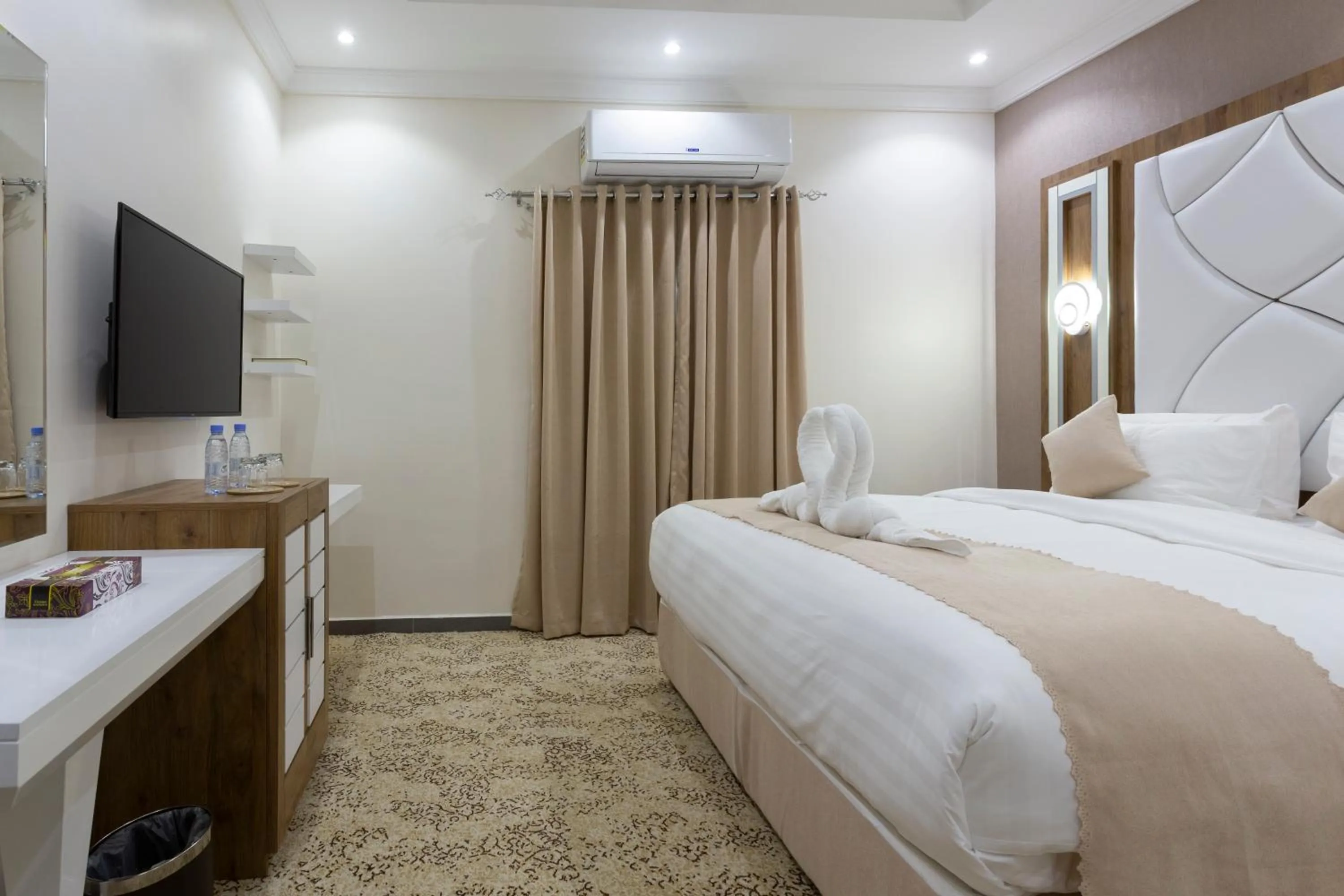 Bed in Dior Inn serviced apartments