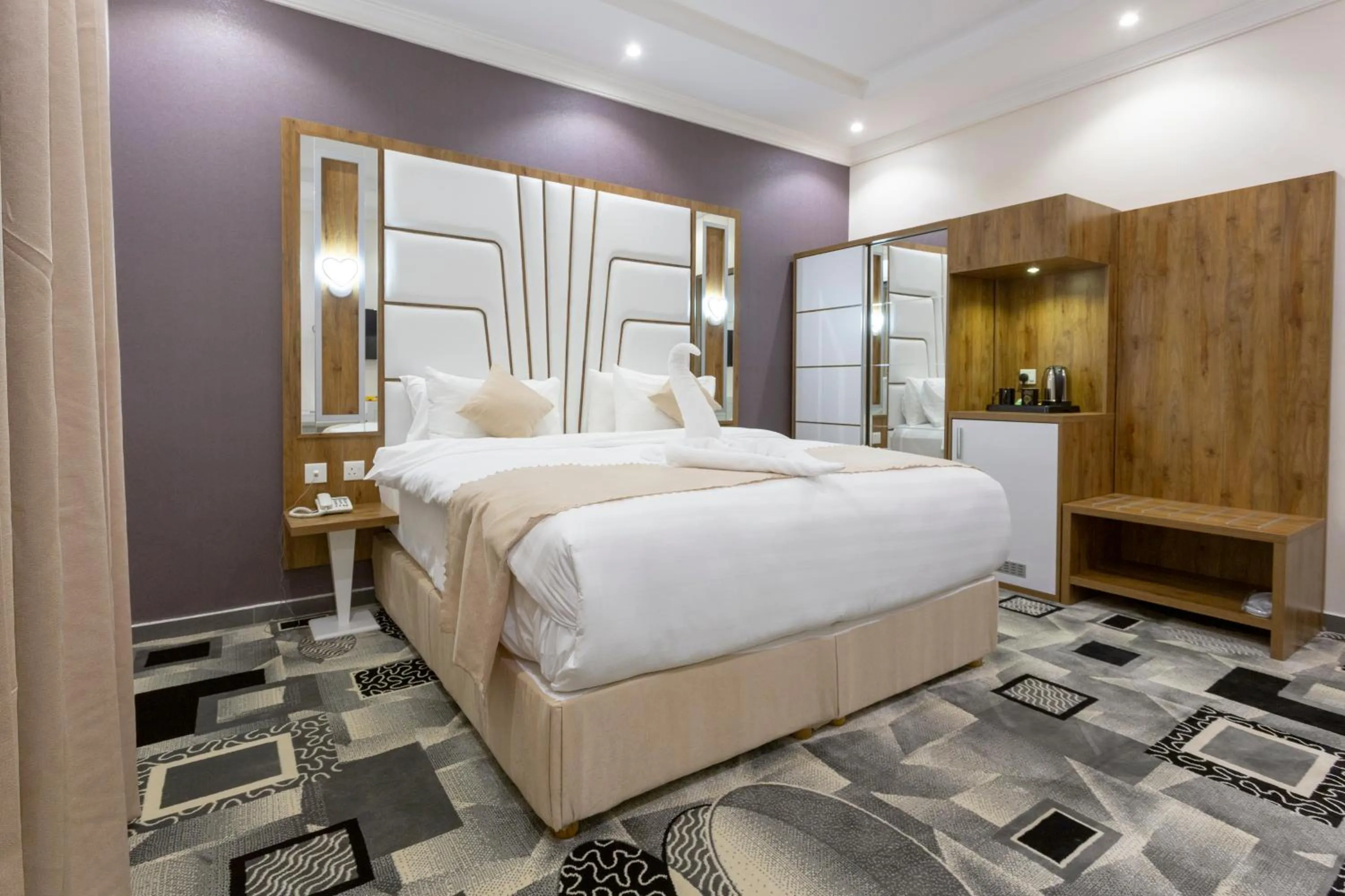 Bed in Dior Inn serviced apartments