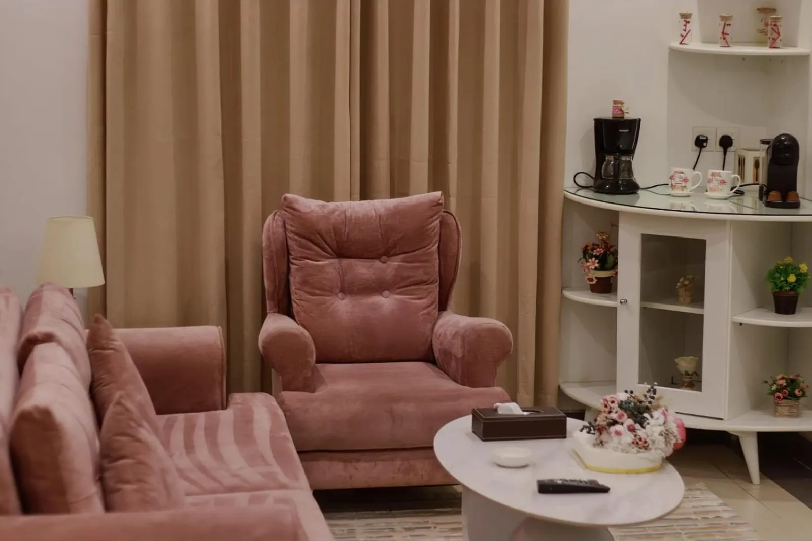 Seating area in Dior Inn serviced apartments