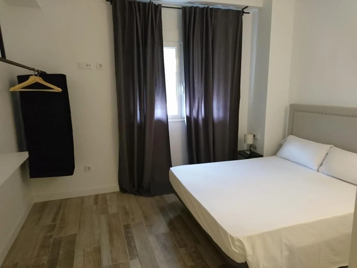 Bed in NWT Central Station Apartments