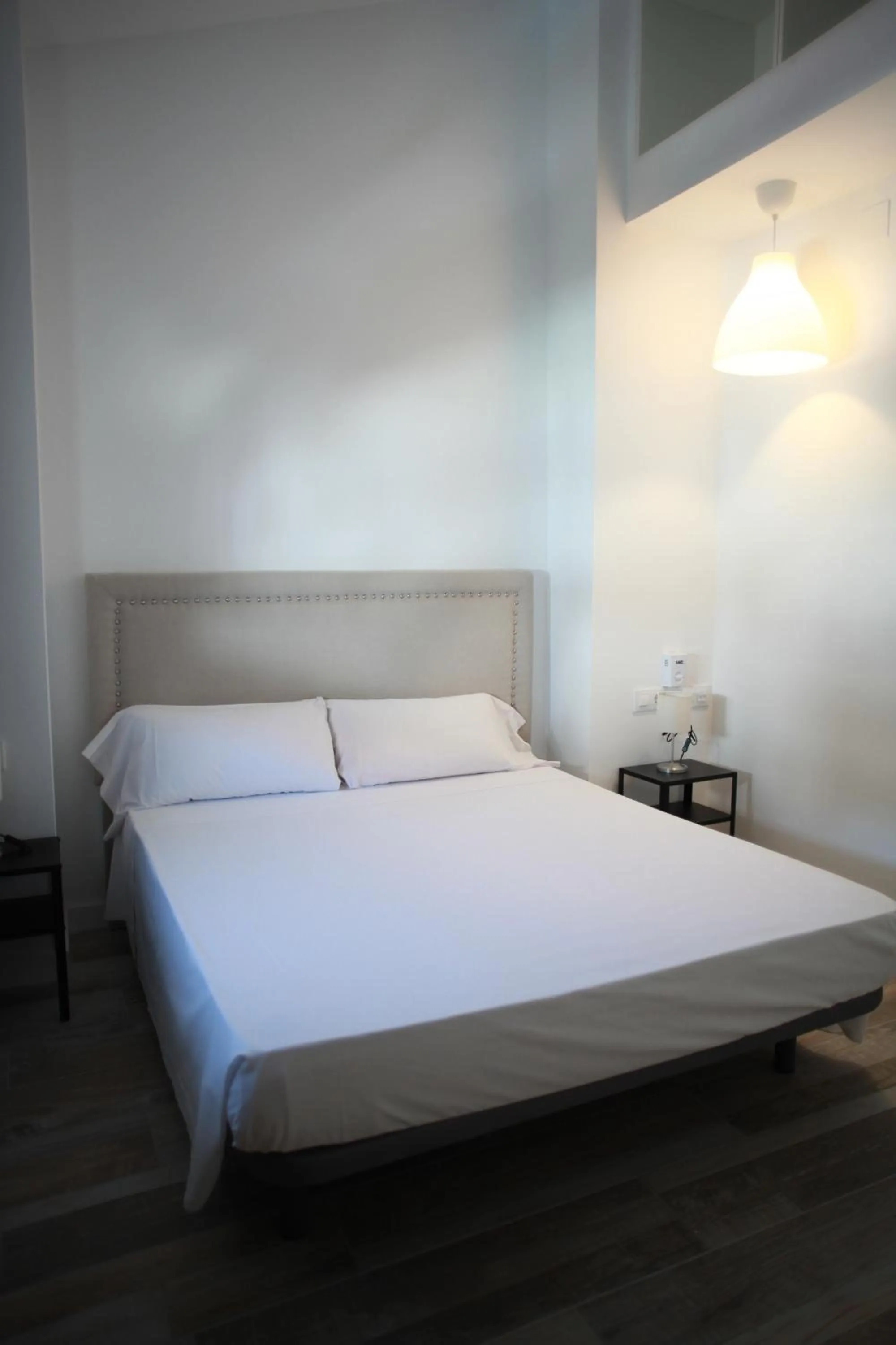 Bed in NWT Central Station Apartments