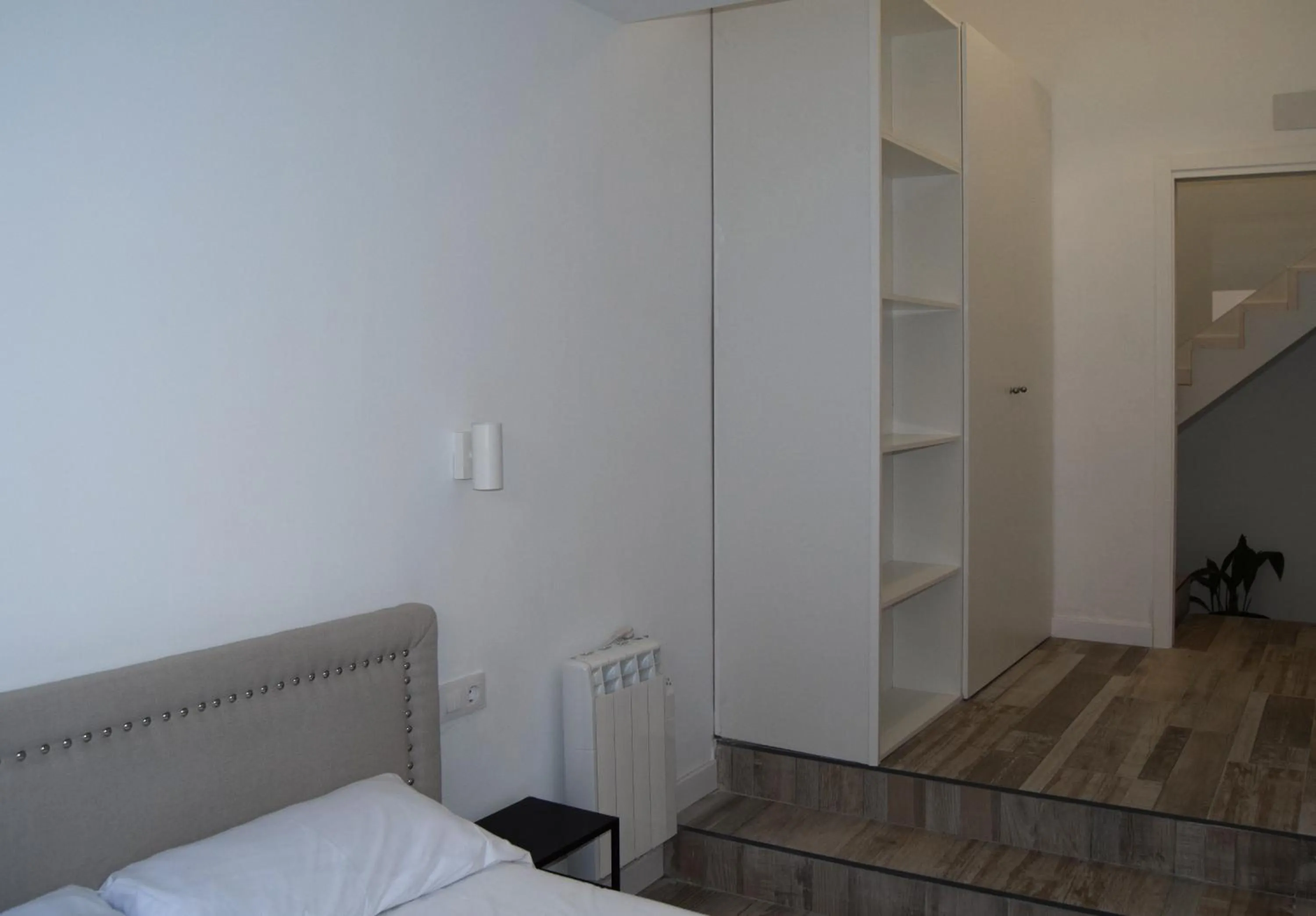 Bed in NWT Central Station Apartments