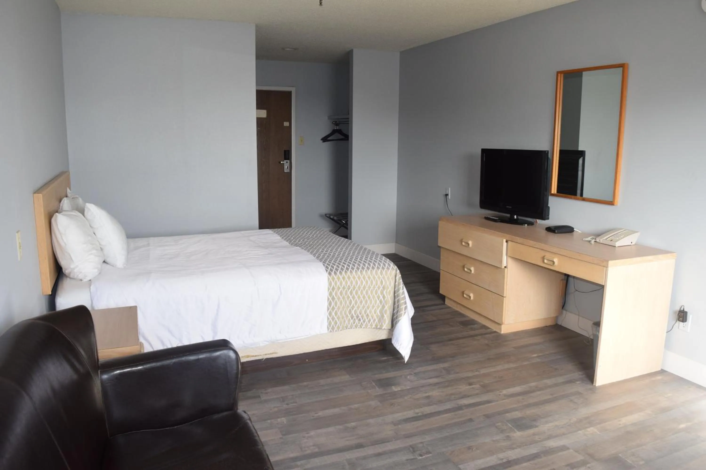 Bed in Venture Inn Hotel