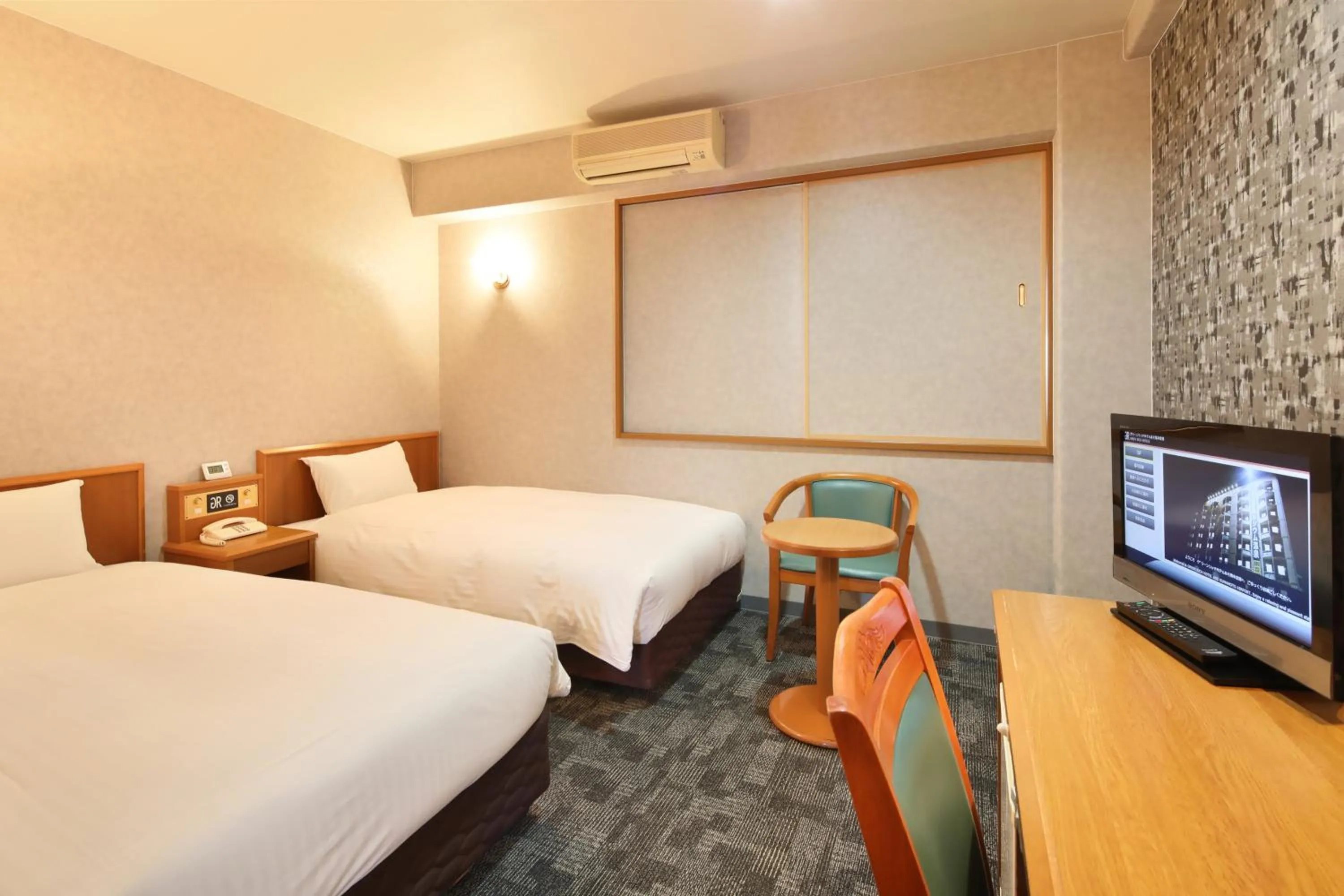 Bed in Green Rich Hotel Aso Kumamoto Airport (Artificial hot spring Futamata Yunohana)