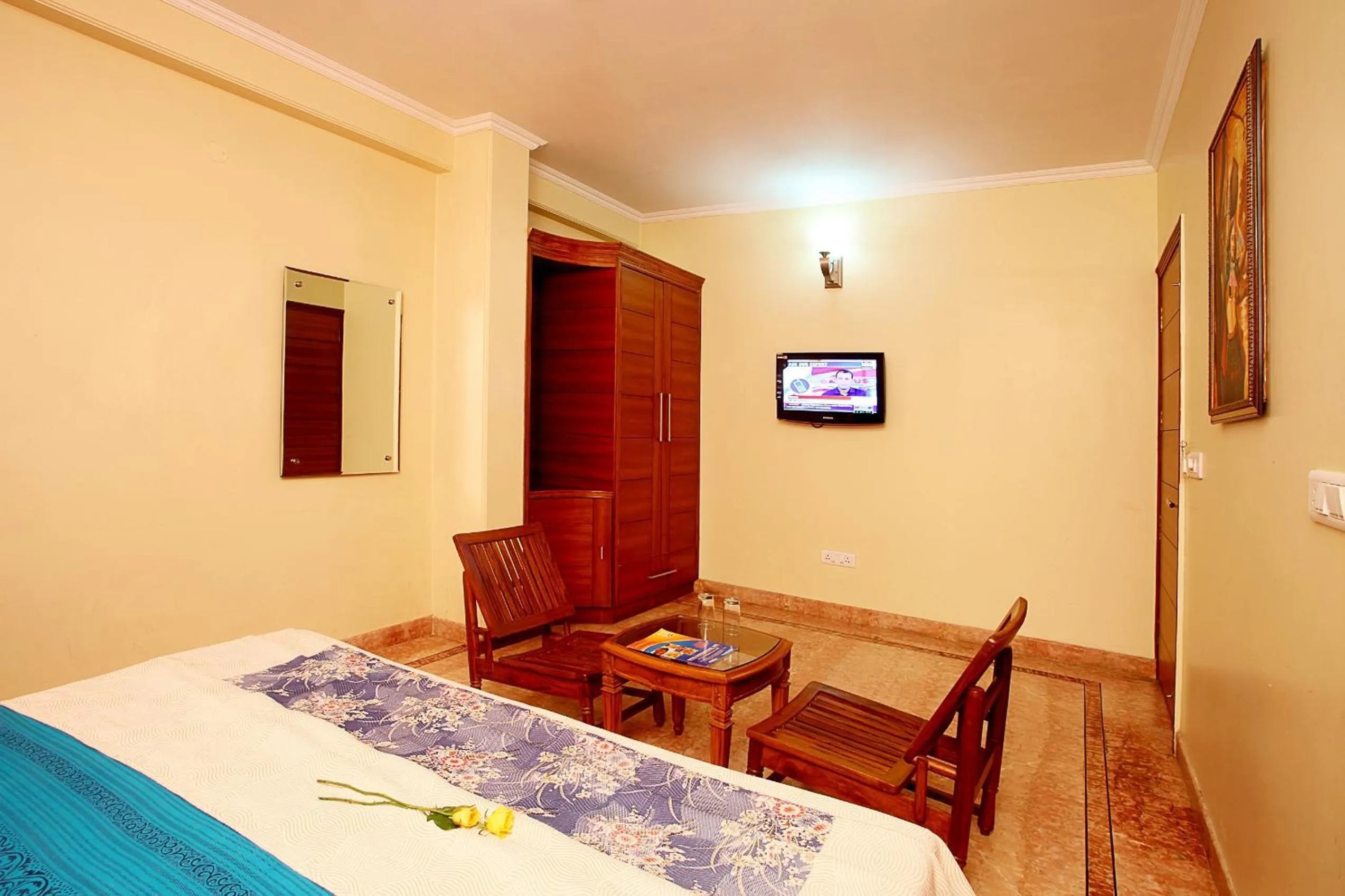 Bed in Indira International Inn