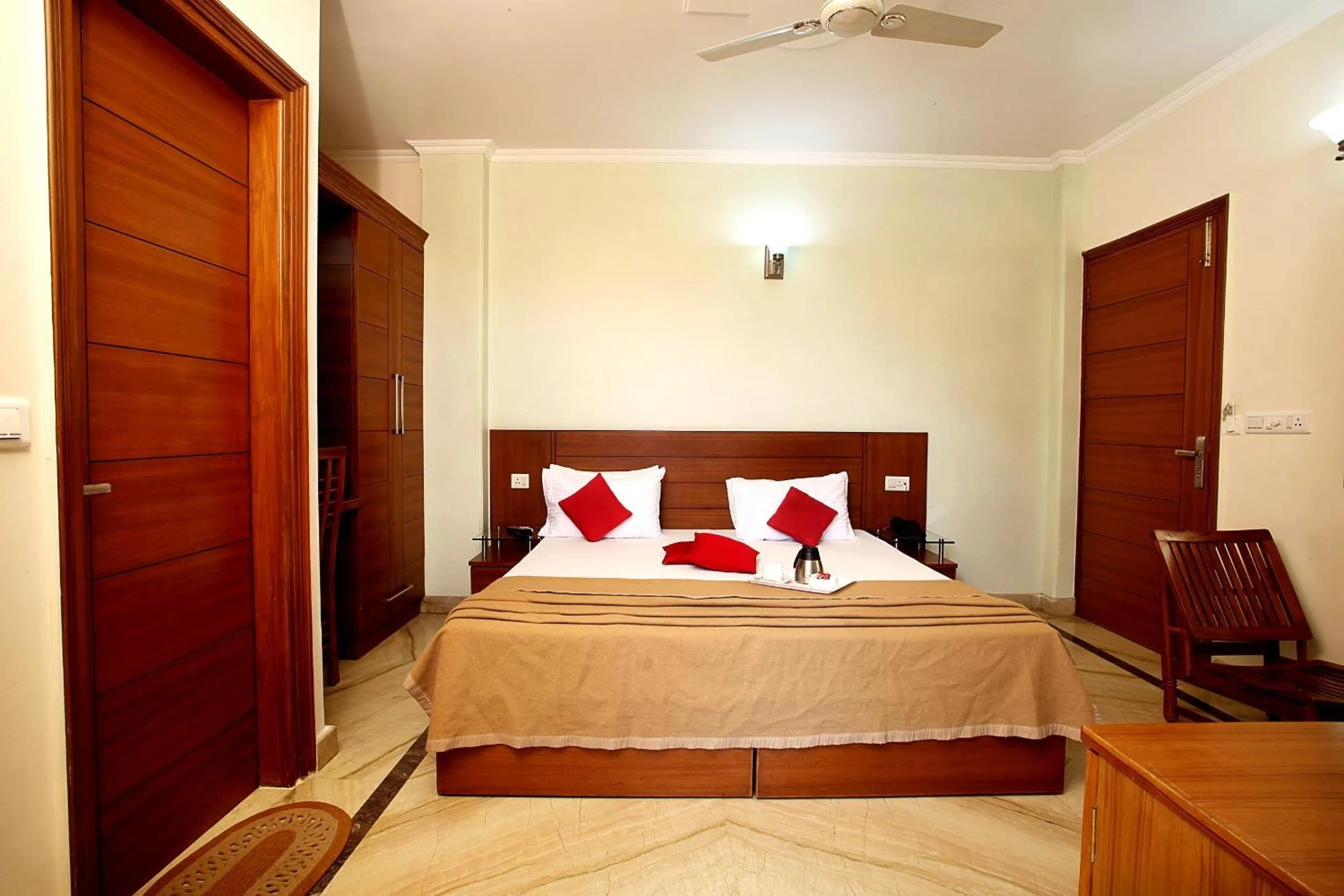 Bedroom, Bed in Indira International Inn