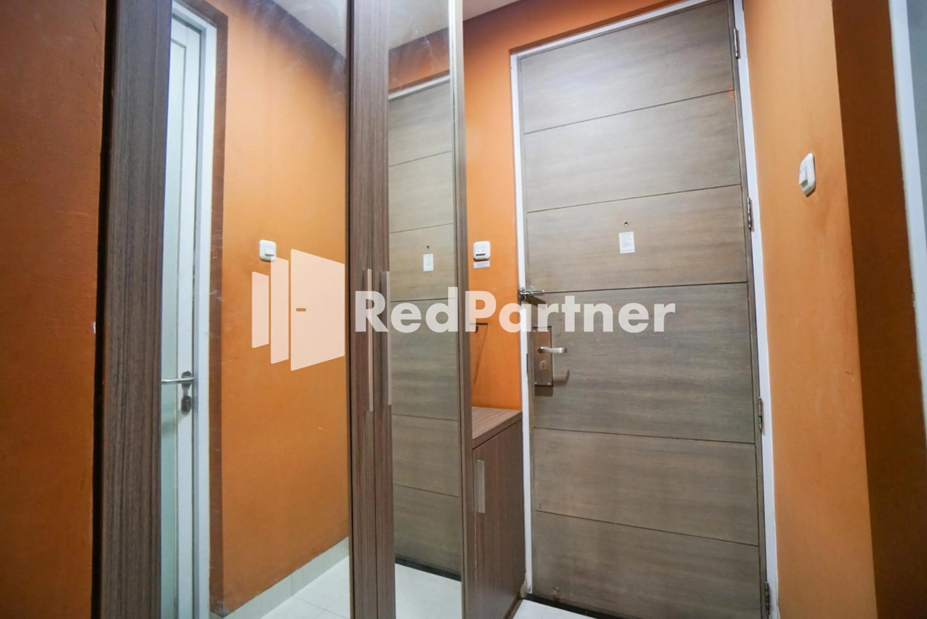 Bedroom in Tirta Mansion Lippo Karawaci Mitra RedDoorz