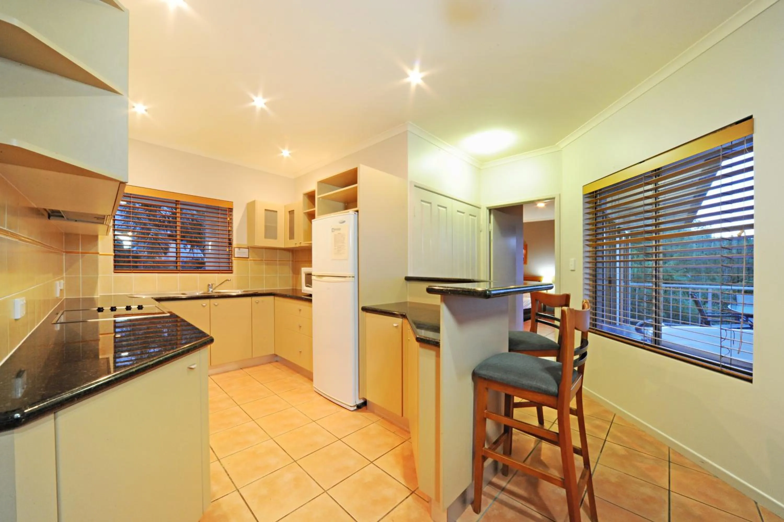 Kitchen or kitchenette in at Boathaven Bay Holiday Apartments