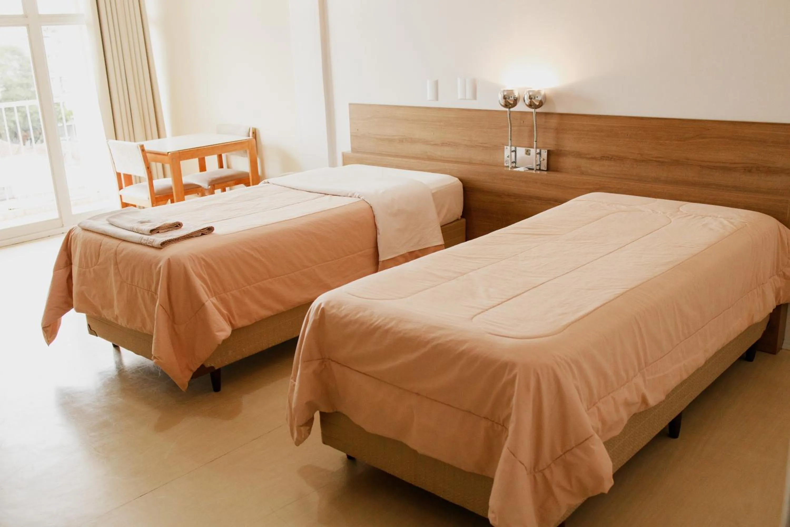 Bed in Rigo Hotel