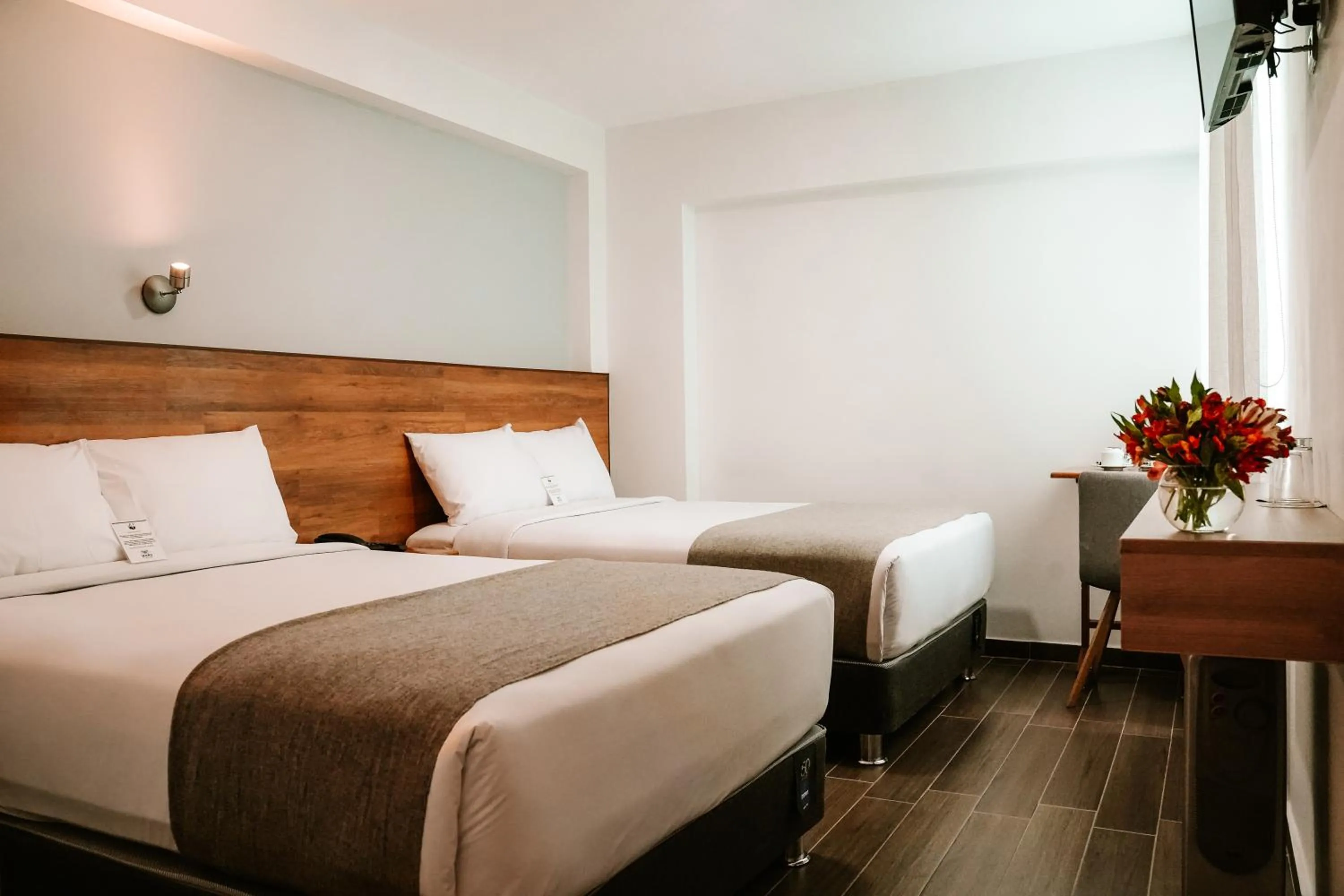 Bed in Muru Homely Hotel Cusco