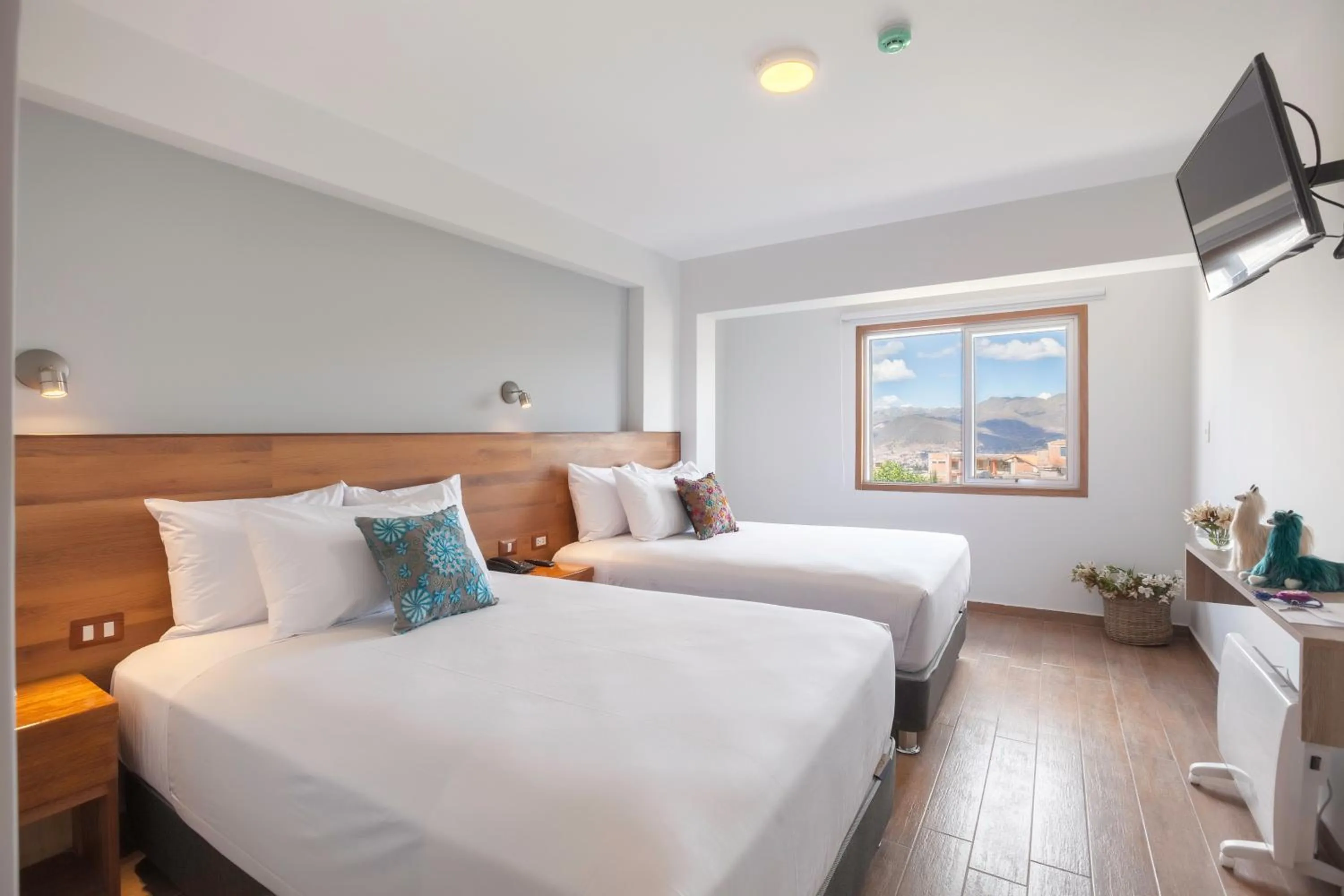 Bed in Muru Homely Hotel Cusco