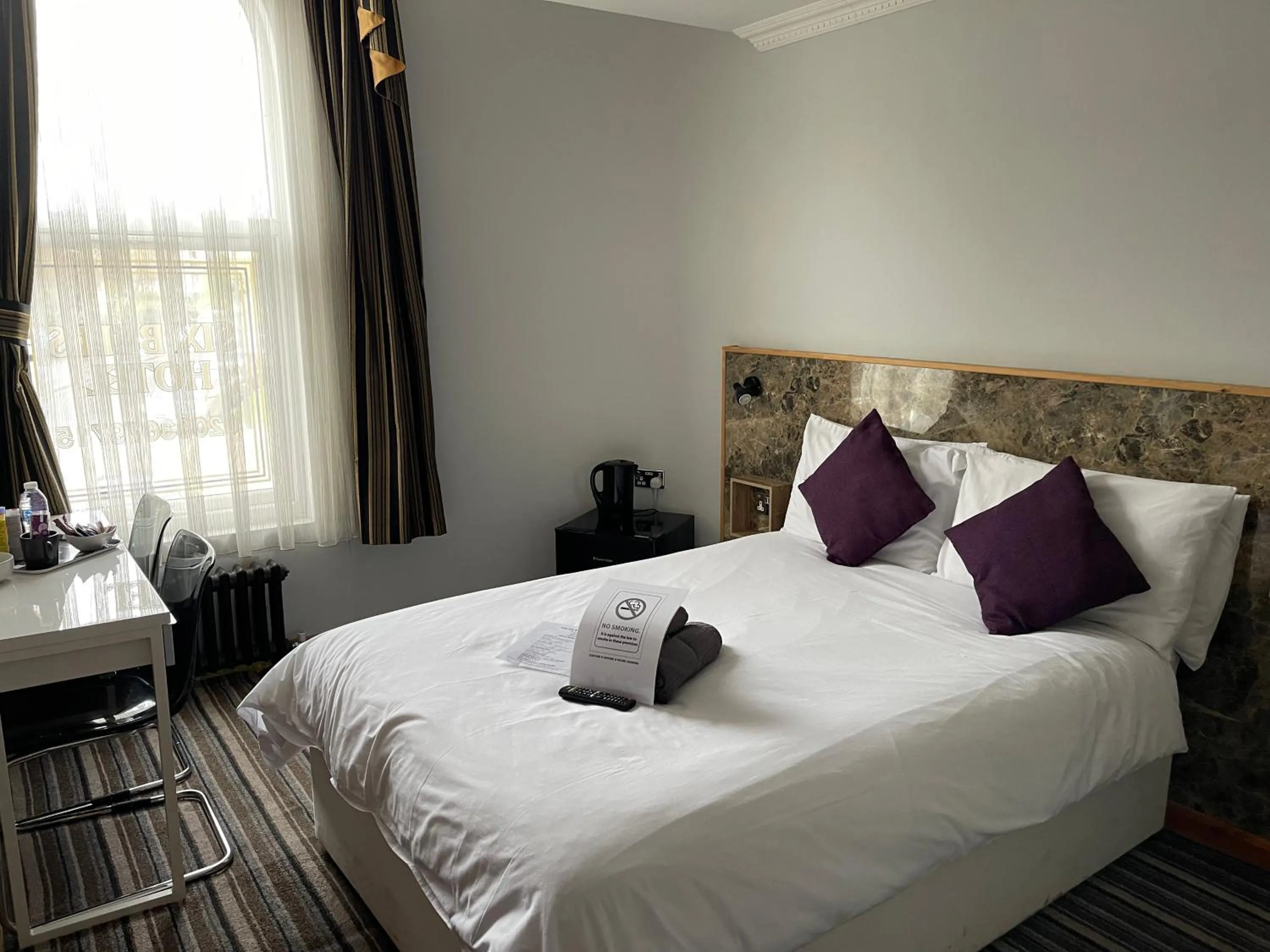 Bed in The Six Bells Hotel