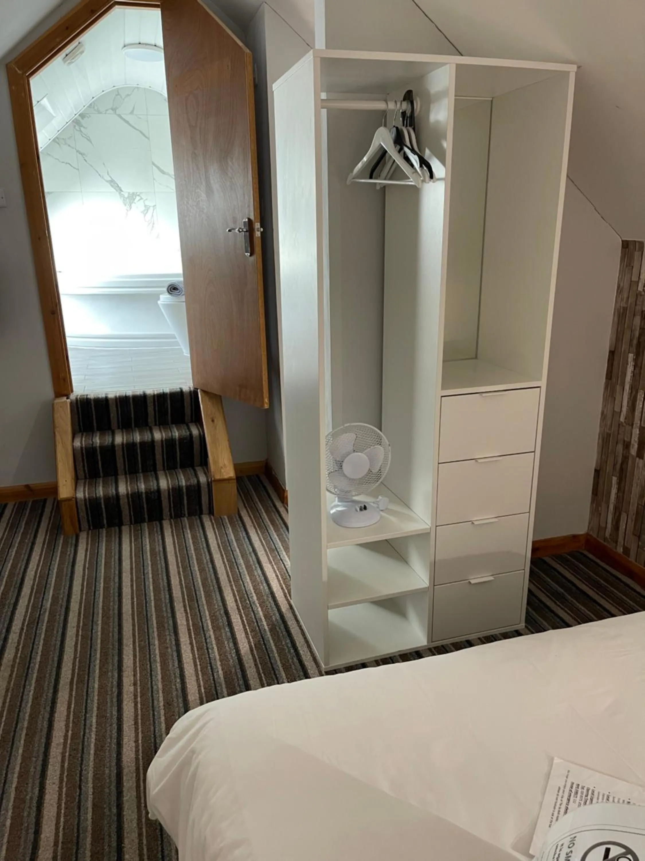 Bed in The Six Bells Hotel